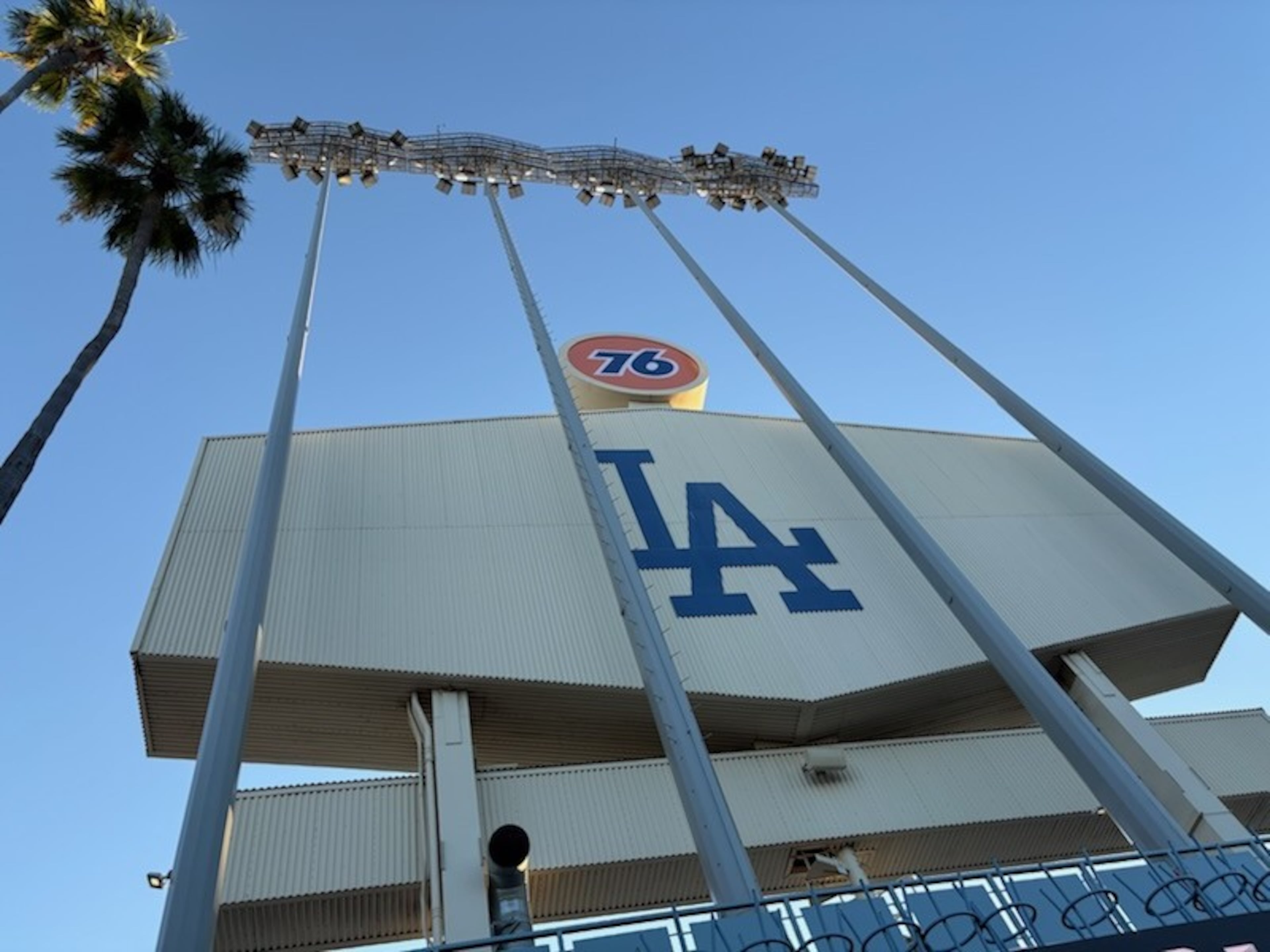 The back of one of Dodger Stadium's hexagonal scoreboards, accented by the palm trees. (Ken Sugiura/AJC)