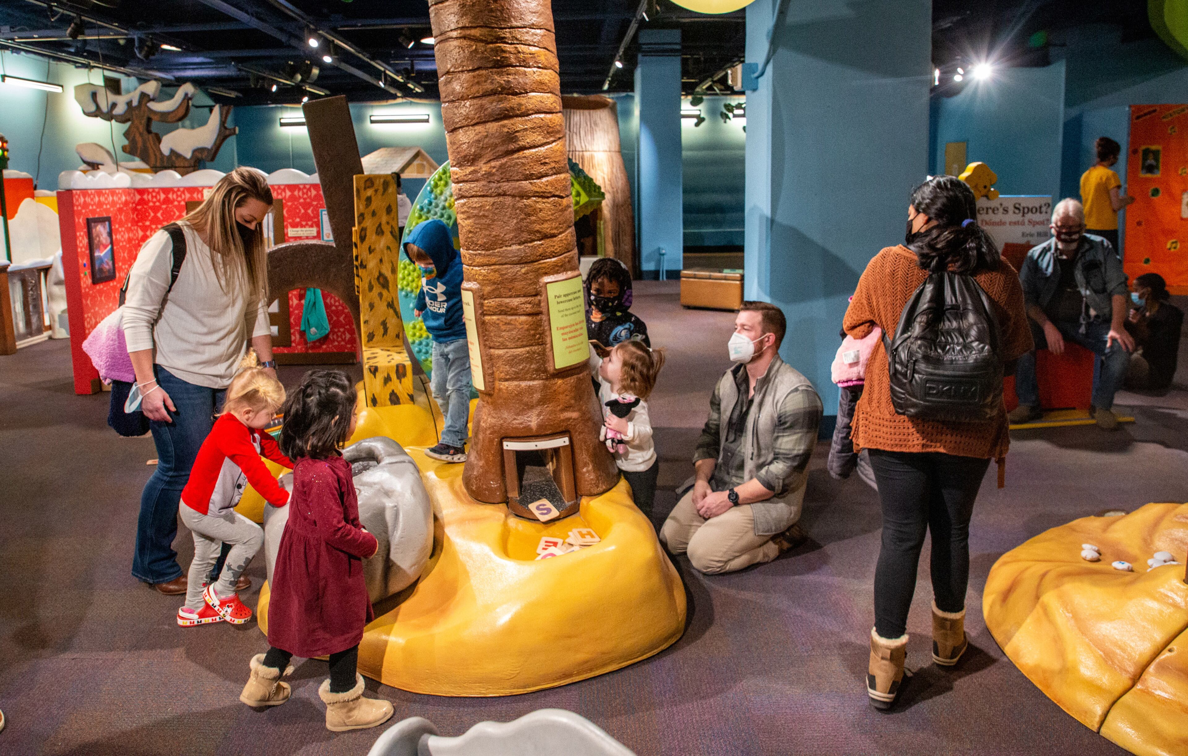 Families play around the book-based experience/exhibit at the Children's Museum of Atlanta on Saturday, February 5, 2022. "Storyland: A Trip Through Childhood Favorites" continues through May 30. (Photo: Steve Schaefer for The Atlanta Journal-Constitution)
