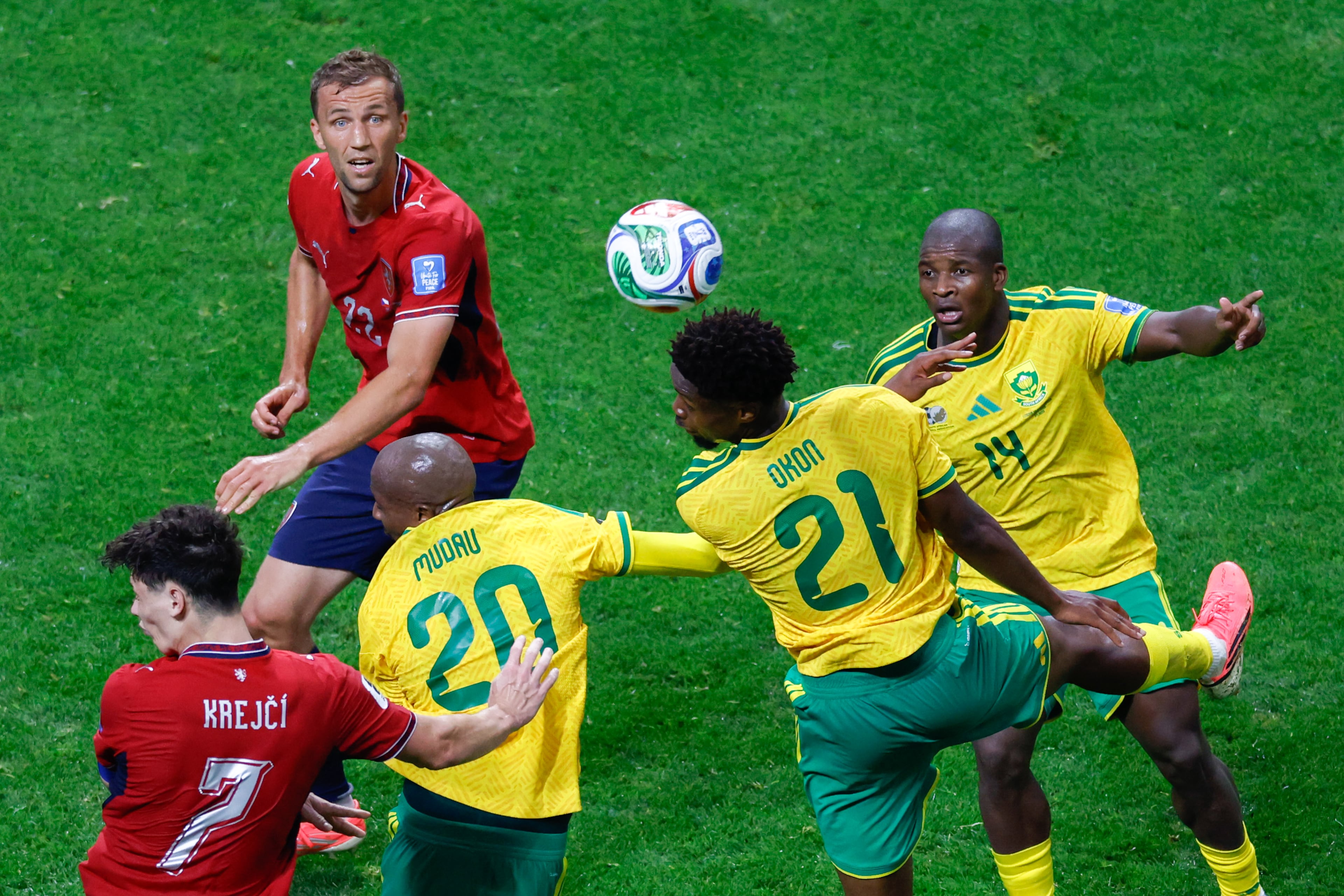 South Africa defender Ime Okon (21) heads the ball under pressure in the second half of the FIFA World Cup Czechia vs. South Africa game at Atlanta Stadium (Mercedes-Benz Stadium) in Atlanta on June 18, 2026. The teams tied 1-1. (Arvin Temkar/AJC)
