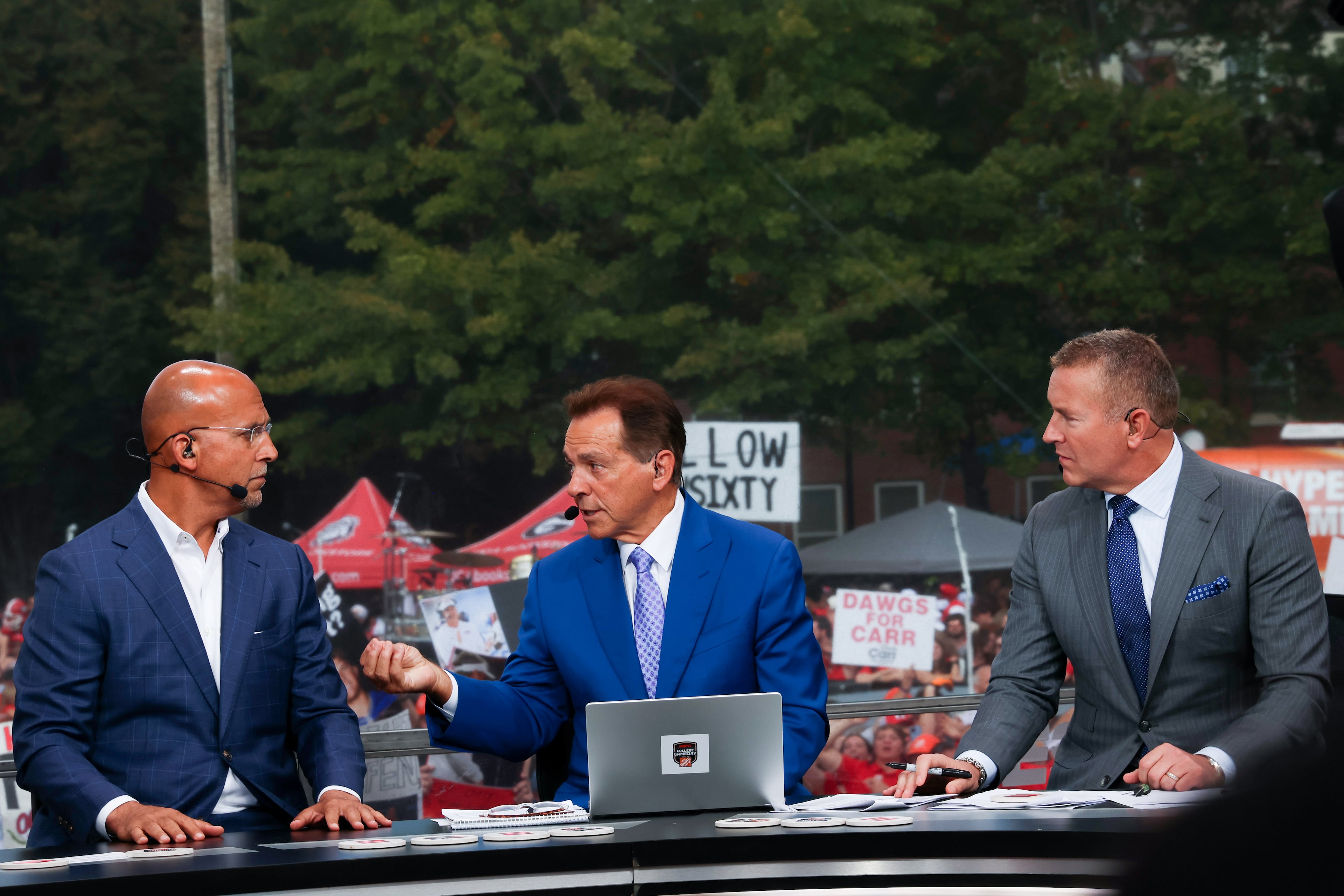 Former Penn State head coach James Franklin (left) talks with Nick Saban (middle) and Kirk Herbstreit (right) during the ESPN College GameDay broadcast from Myers Quad at UGA on Saturday, Oct. 18, 2025. (C.J. Bartunek for the AJC)