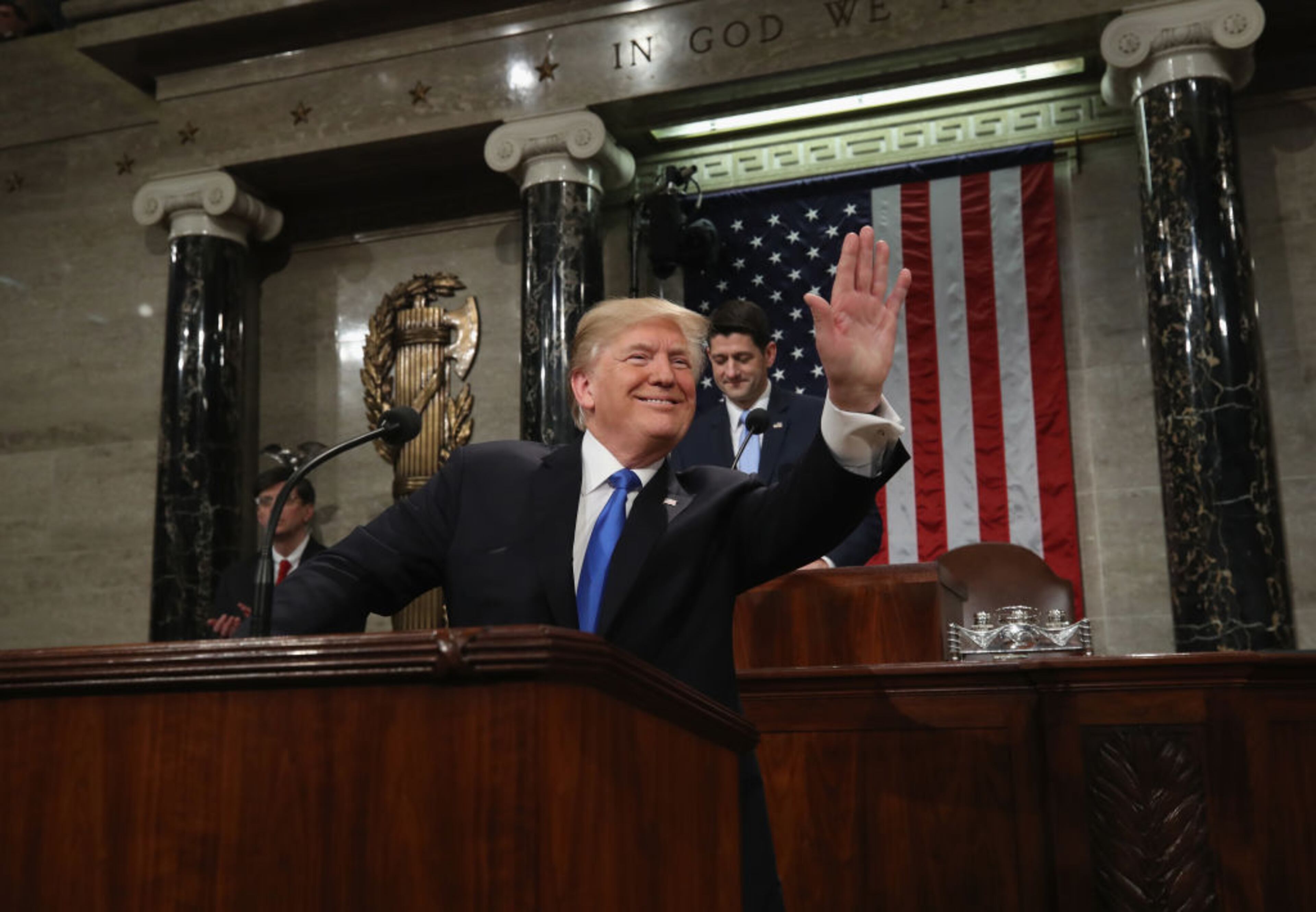 WASHINGTON, DC - JANUARY 30: U.S. President Donald J. Trump waves as he arrives during the State of the Union address in the chamber of the U.S. House of Representatives January 30, 2018 in Washington, DC. This is the first State of the Union address given by U.S. President Donald Trump and his second joint-session address to Congress. (Photo by Win McNamee/Getty Images)