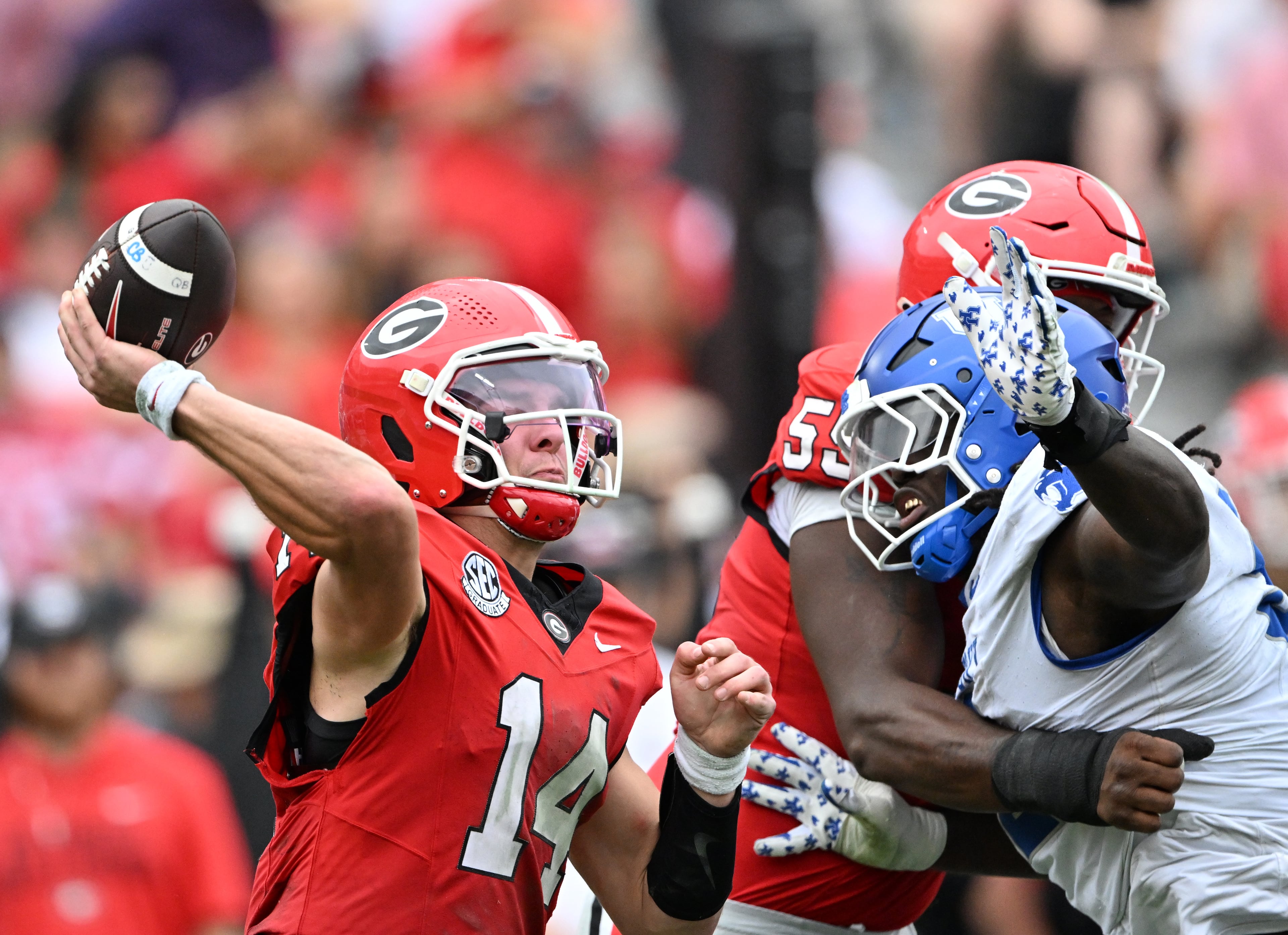 Georgia quarterback Gunner Stockton (14) gets off a pass during the first half in a NCAA college football game at Sanford Stadium, Saturday, October 4, 2025, in Athens. (Hyosub Shin / AJC)
