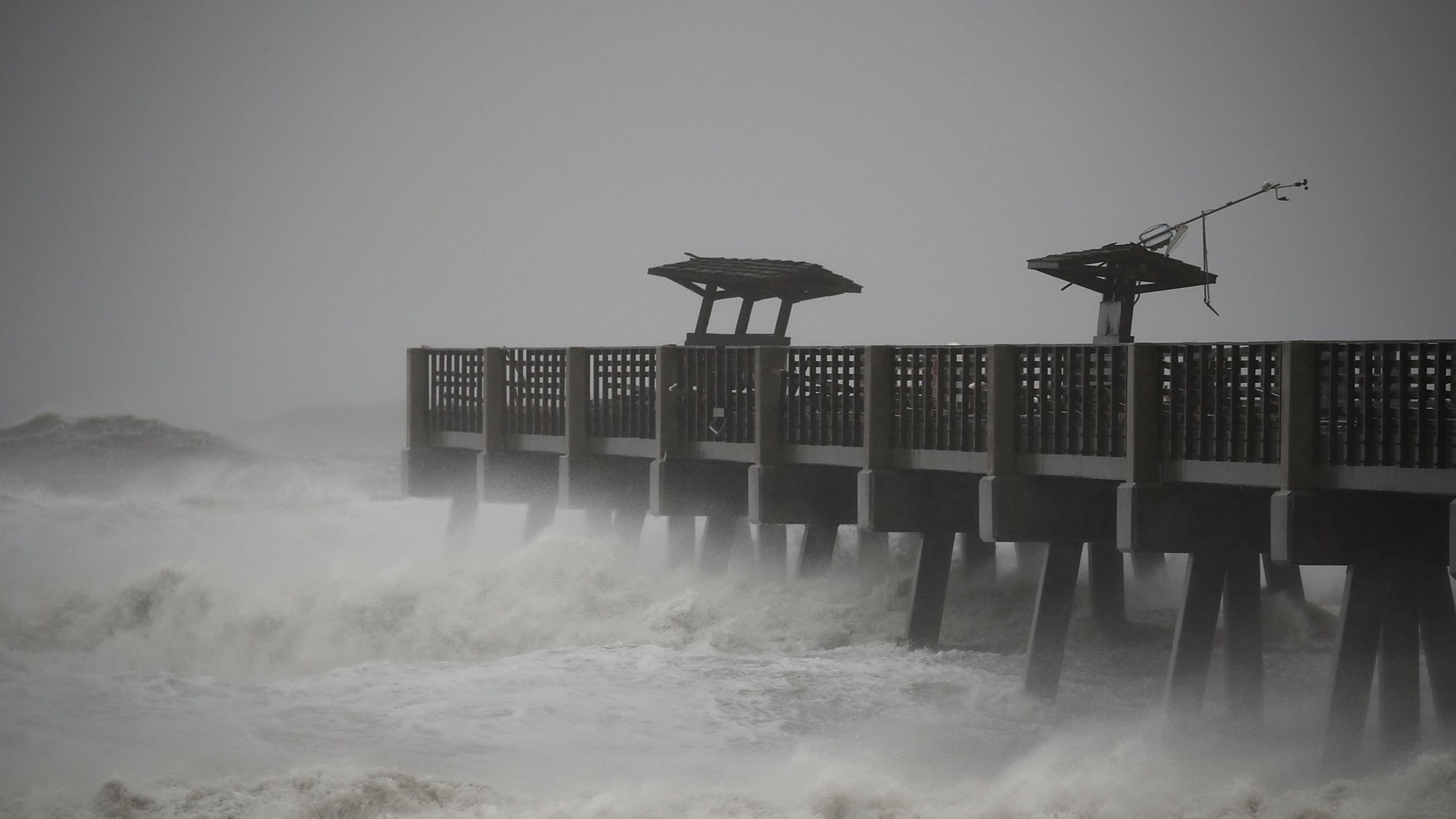 Large waves caused by Hurricane Matthew pound the Jacksonville Pier and was damaged by the storm, October 7, 2016 in Jacksonville Beach, Florida. Hurricane Matthew passed by offshore bringing heavy winds and flooding. (Photo by Mark Wilson/Getty Images)