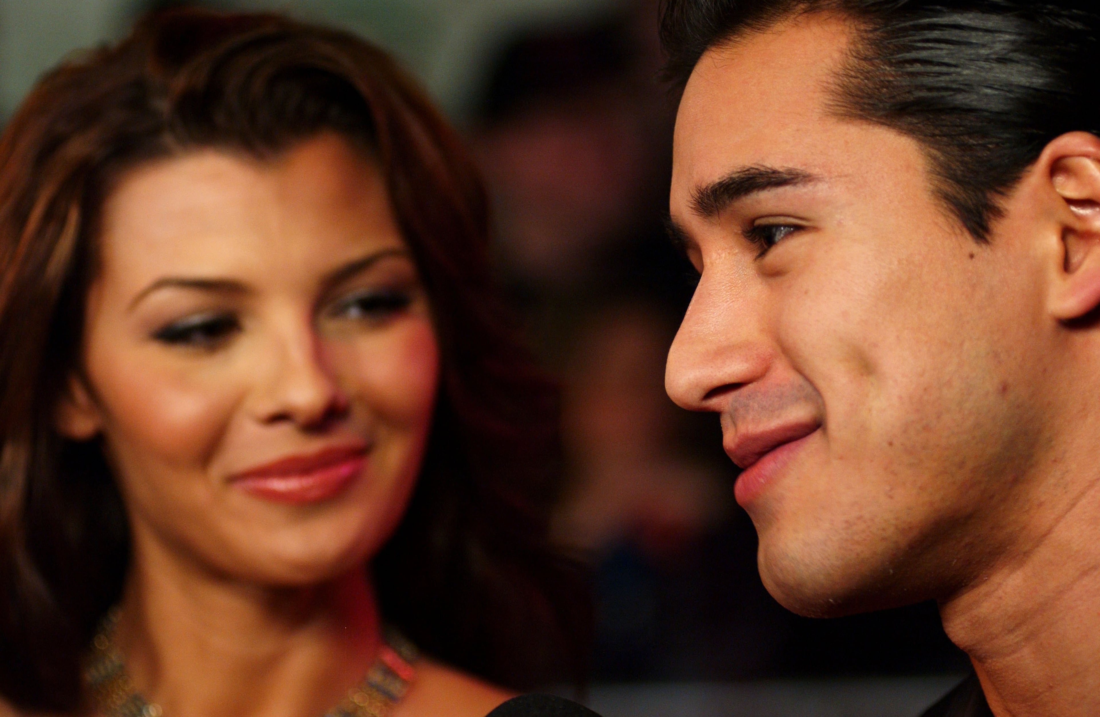 Bonnie Summerville looks at Mario Lopez upon arriving at the opening of the Palms Casino Resort on Nov. 15, 2001, in Las Vegas.