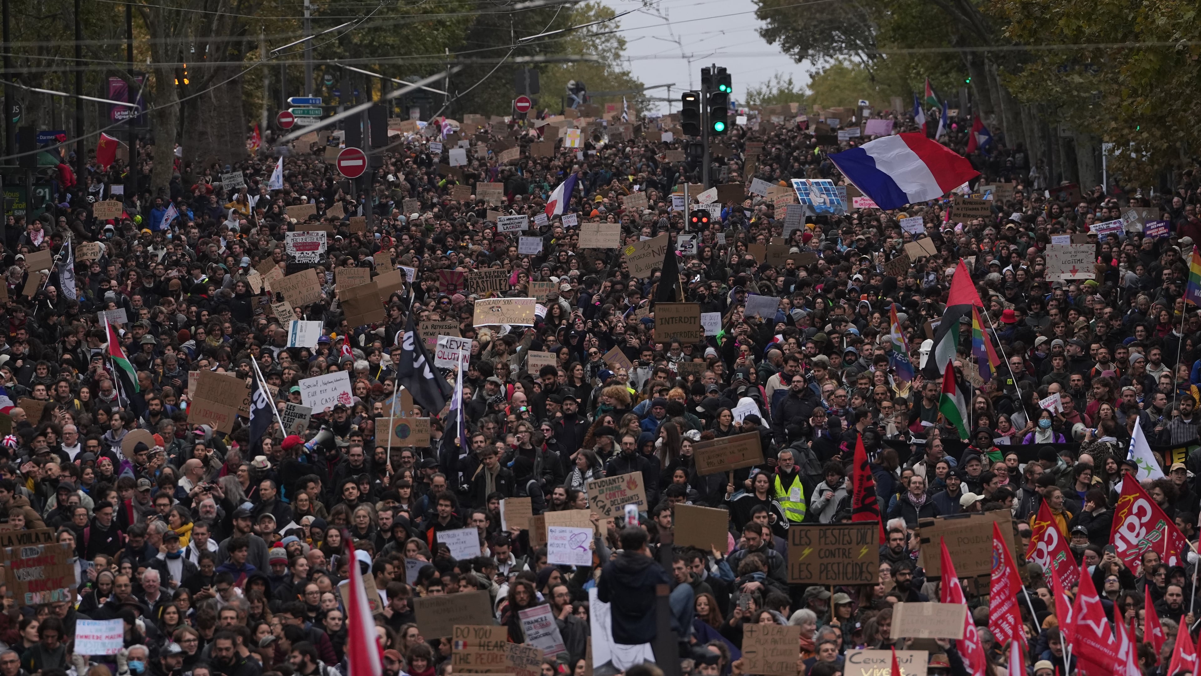 Protesters march during a demonstration against rising living costs in Paris, Saturday, Oct. 24, 2026. (AP Photo/Thibault Camus)