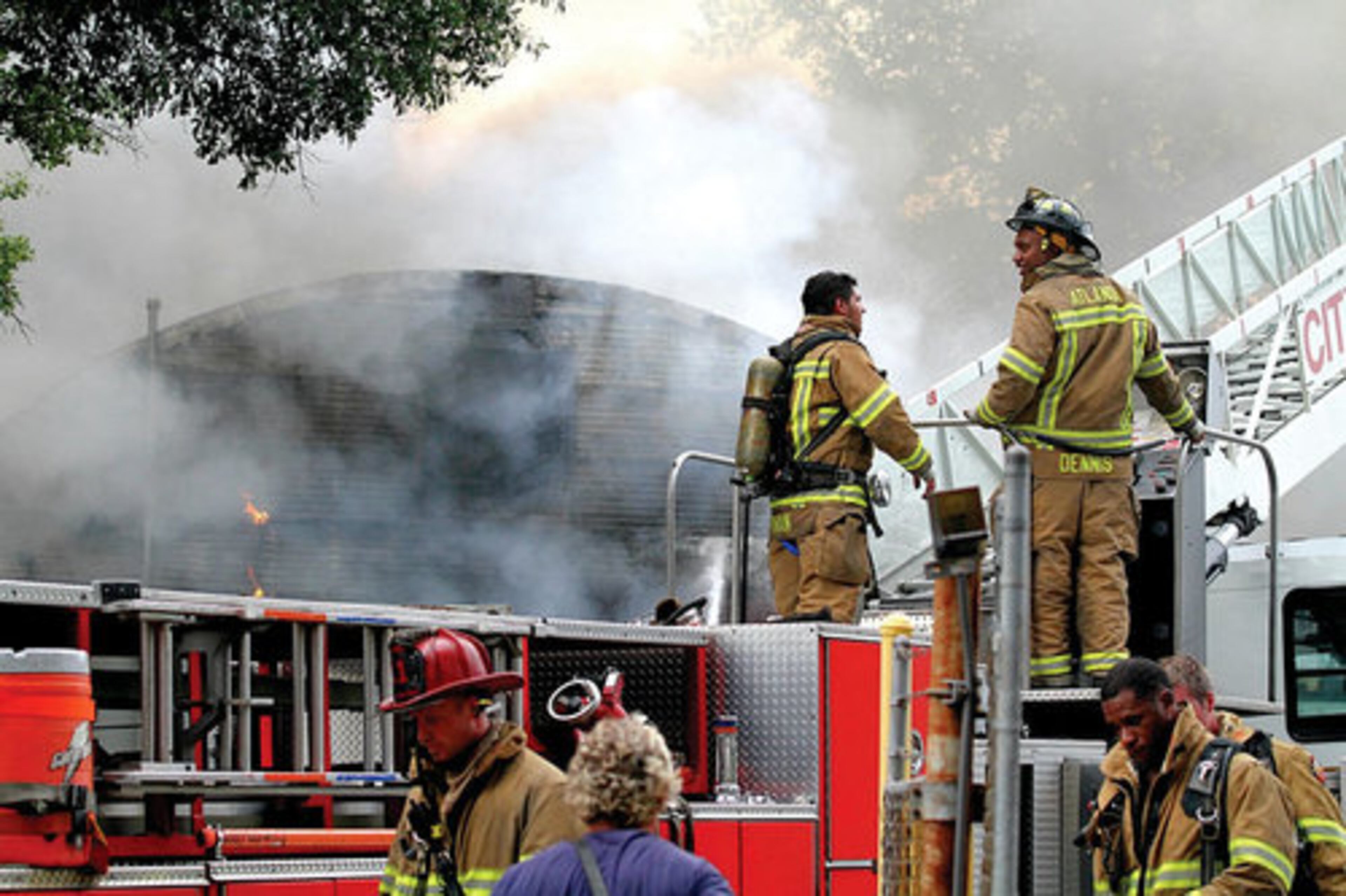 Atlanta fire dispatched multiple engines to battle the blaze at the Doors Unlimited warehouse near Atlantic Station.
