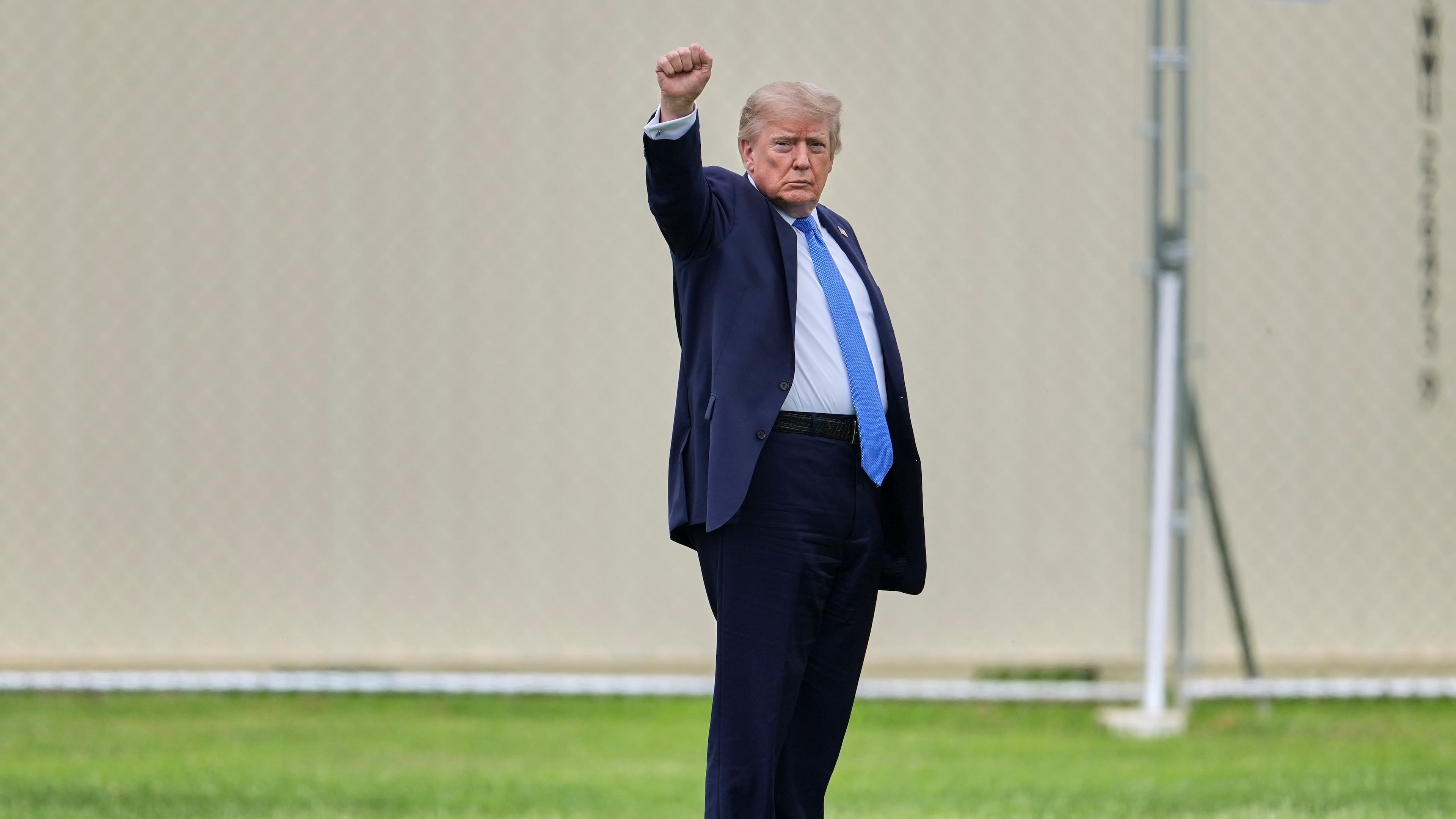 President Donald Trump gestures as he walks to board Marine One on the Ellipse, Friday, Aug. 14, 2026, near the White House in Washington. (AP Photo/Mark Schiefelbein)