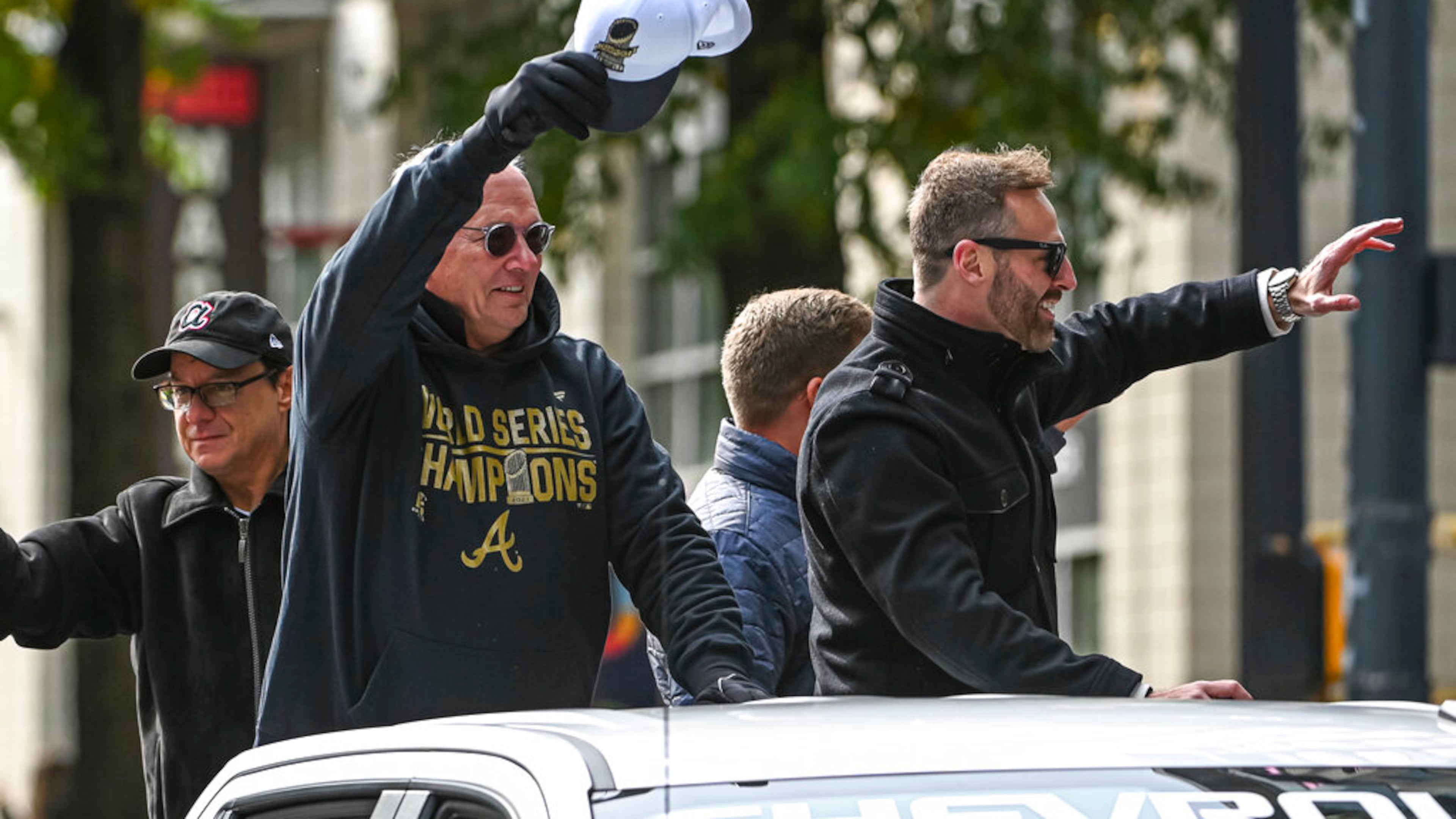 Braves radio announcers Joe Simpson (left) and Ben Ingram wave to fans during the championship parade for the 2021 World Champions on November 05, 2021, on Peachtree Street. (Photo by John Adams/Icon Sportswire)