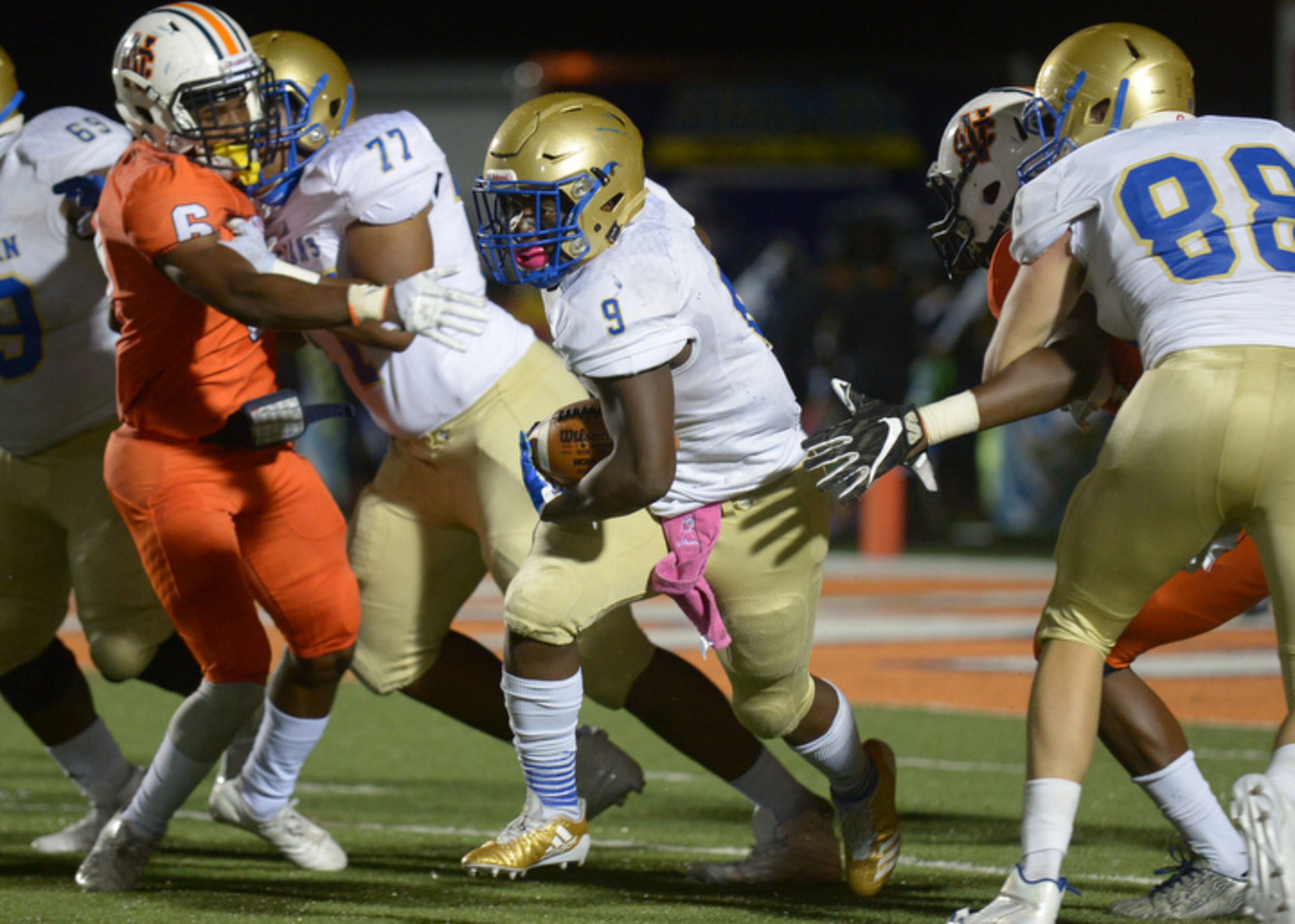 Kennesaw, Ga. -- McEachern's senior RB Jalen Thornton (9) punches through North Cobb's defense during a play in first half of his game at North Cobb Friday, October 6, 2017. Special/Daniel Varnado