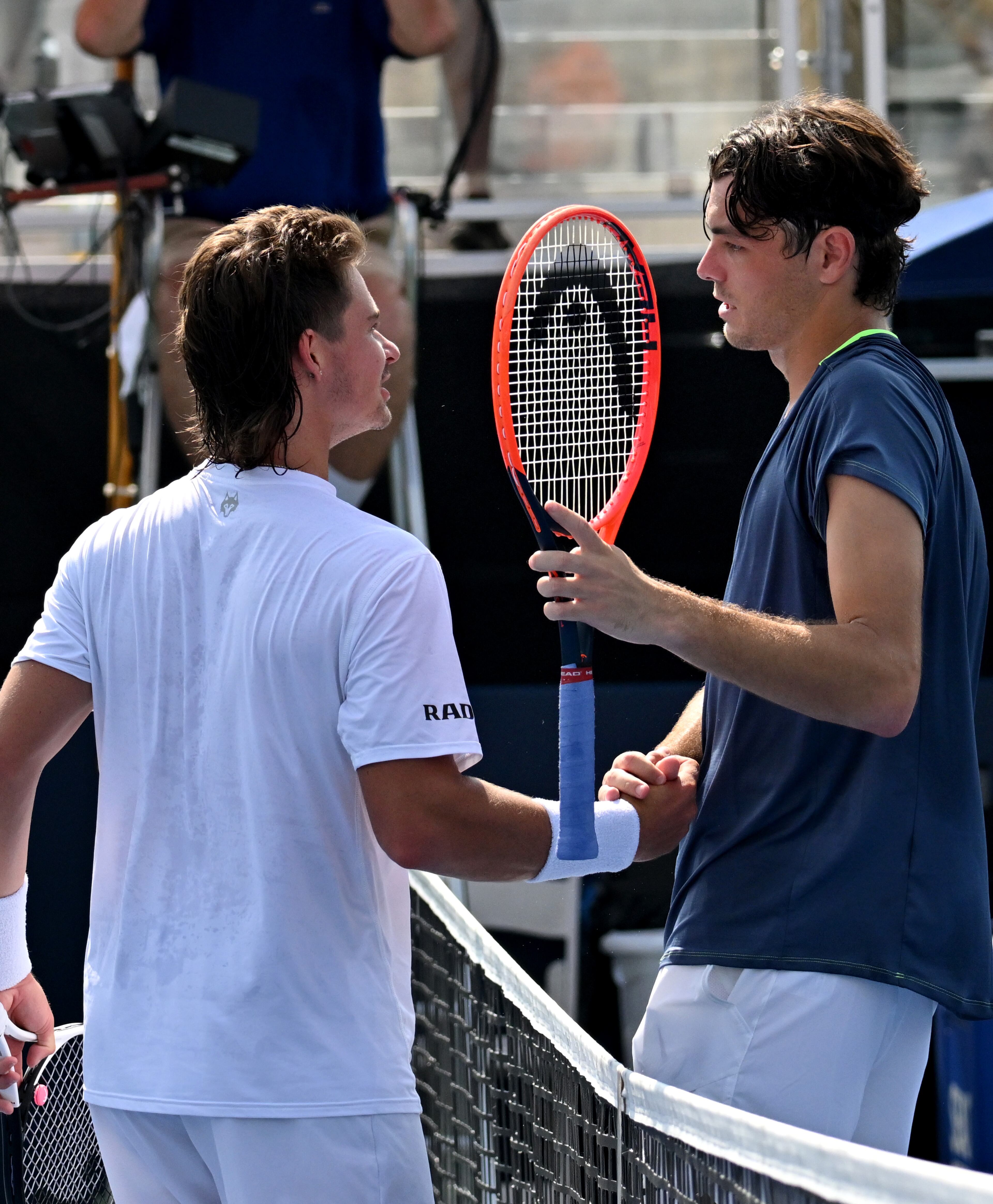 Taylor Fritz (right) and J.J. Wolf shake hands after Fritz beat Wolf during a semifinal match at the 2023 Atlanta Tennis Open at Atlantic Station, Saturday, July 29, 2023, in Atlanta. (Hyosub Shin / Hyosub.Shin@ajc.com)