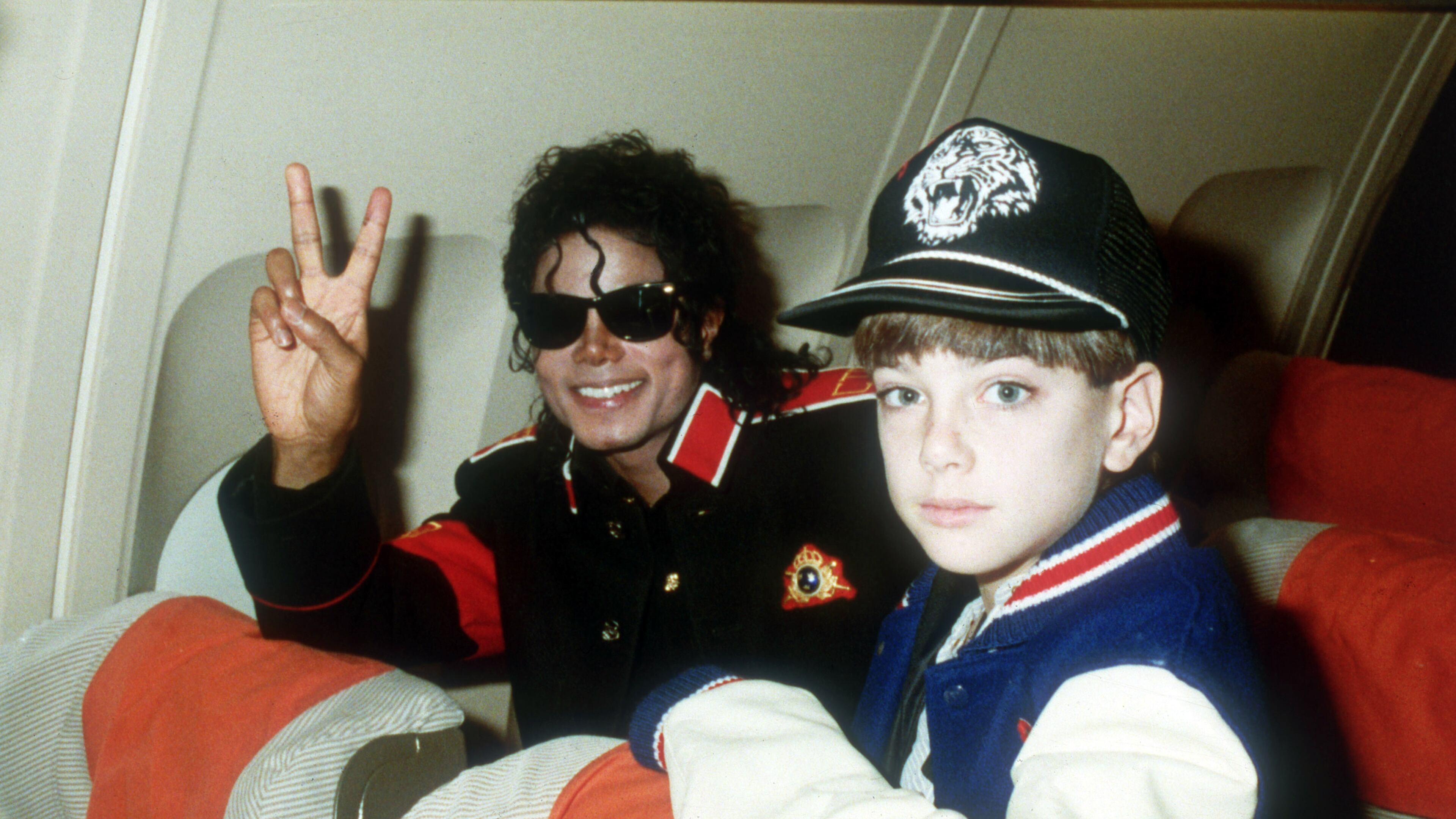 UNSPECIFIED - JULY 11: Michael Jackson with 10 year old Jimmy Suchcraft on the tour plane on 11th of July 1988.(Photo by Dave Hogan/Getty Images)
