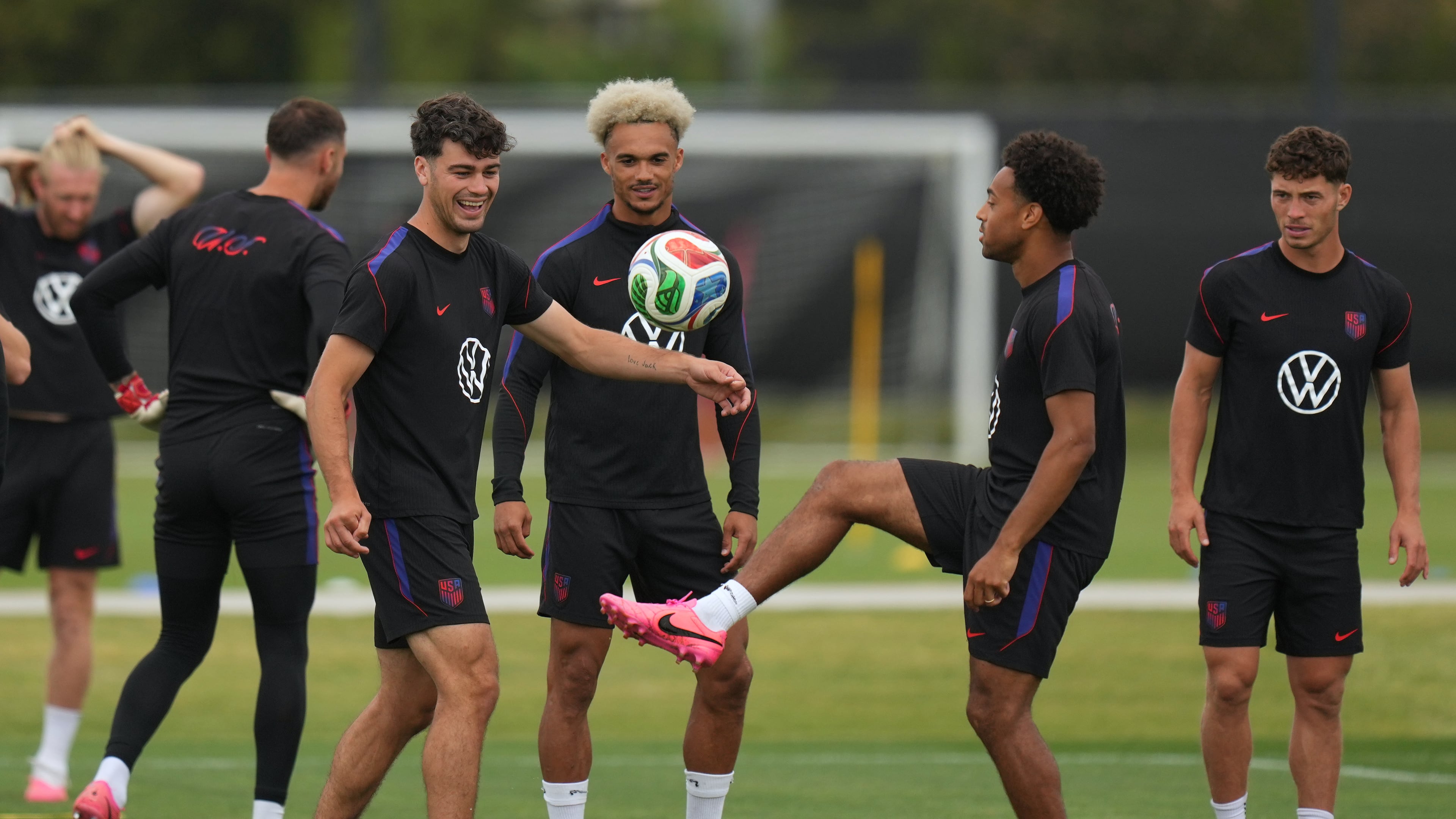 United States' Giovanni Reyna, center left, Antonee Robinson, center, and Tyler Adams practice during a training session ahead of their FIFA World Cup match against Bosnia in Irvine, Calif., Monday, June 29, 2026. (AP Photo/Andre Penner)