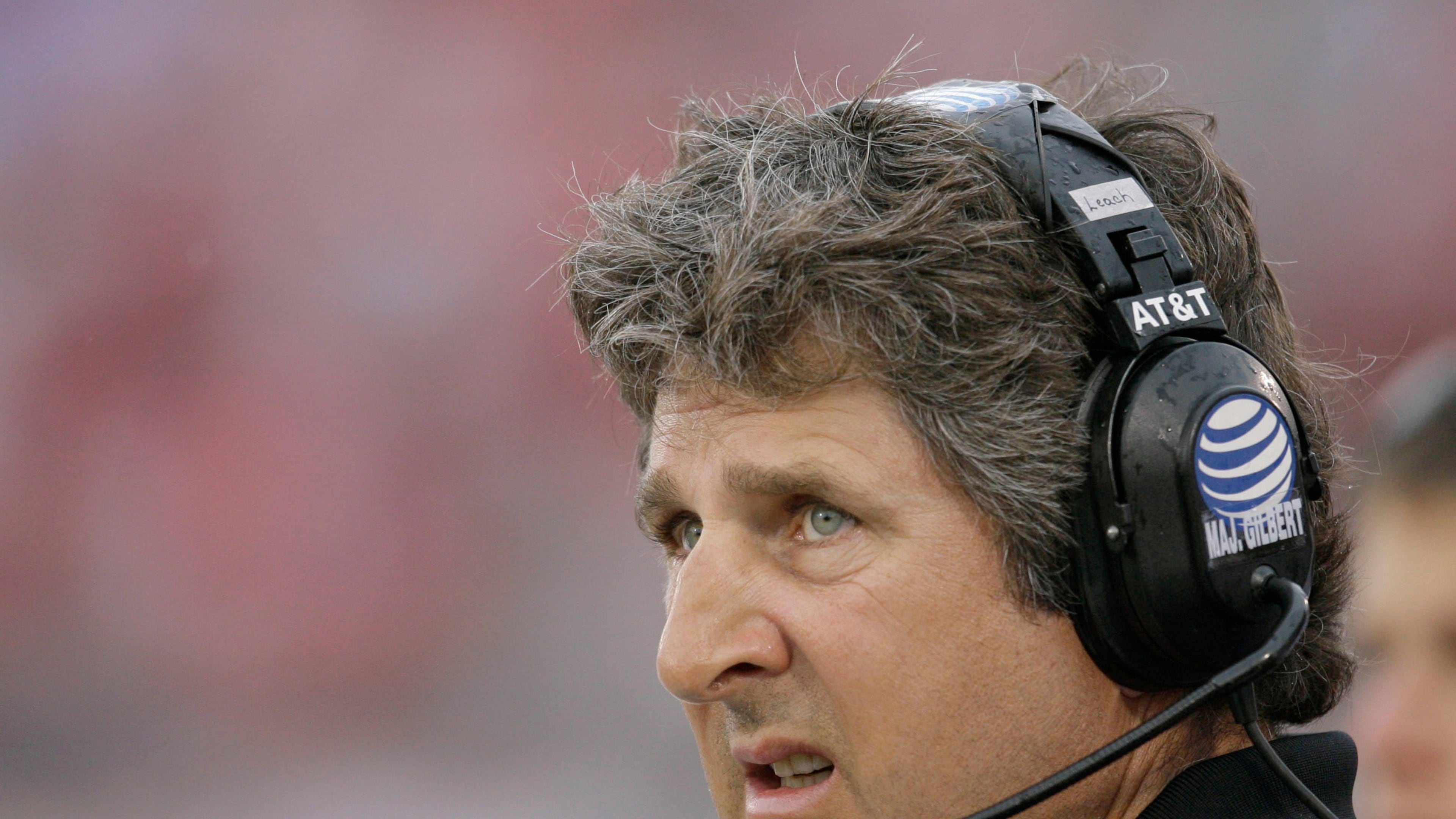 FILE - Texas Tech head coach Mike Leach looks at the scoreboard during the first quarter of a football game against SMU, Sept. 3, 2007, in Dallas. (AP Photo/Matt Slocum, file)