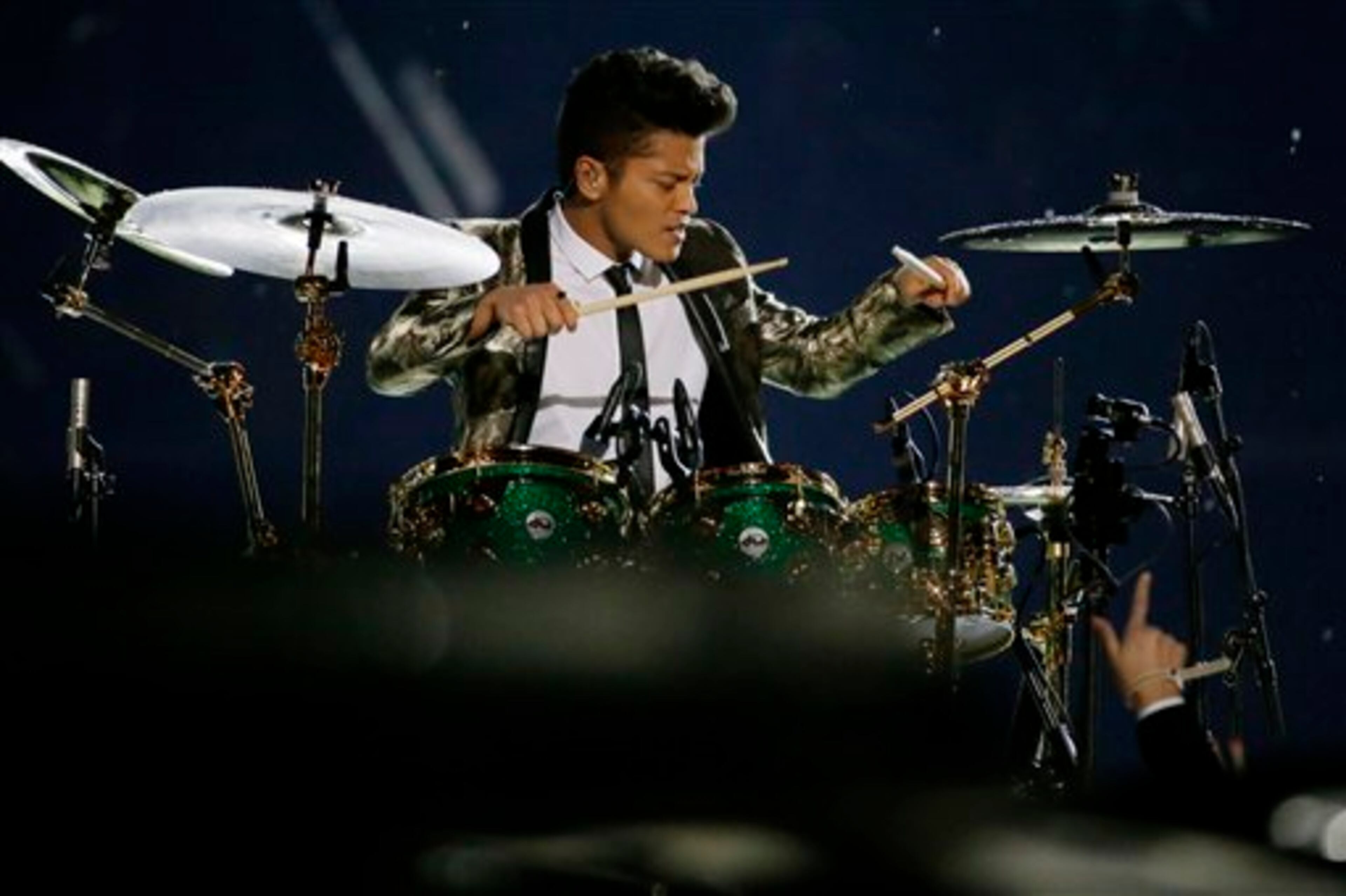 Bruno Mars performs during the halftime show of the NFL Super Bowl XLVIII football game between the Seattle Seahawks and the Denver Broncos Sunday, Feb. 2, 2014, in East Rutherford, N.J. (AP Photo/Mark Humphrey)