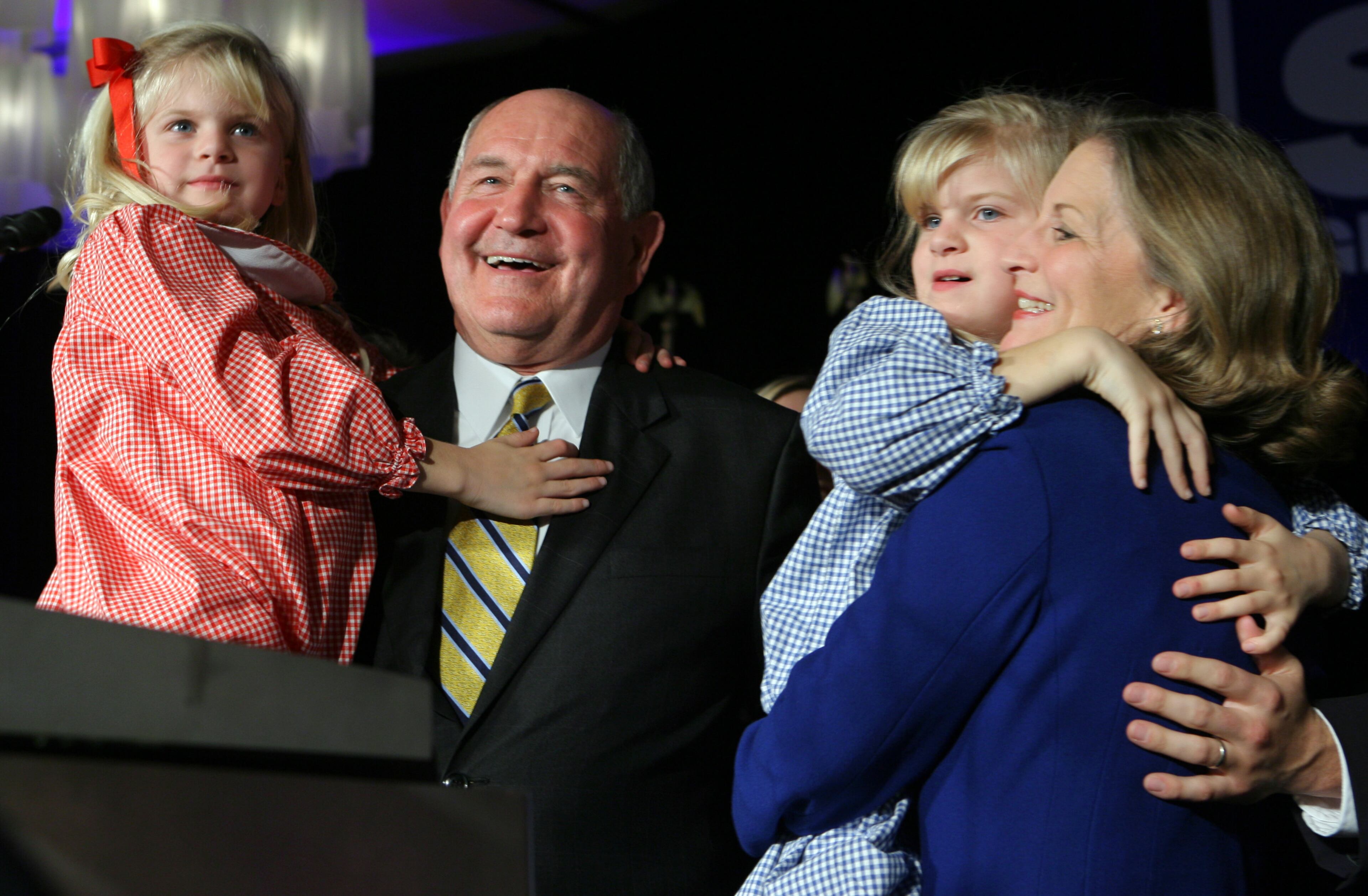 ATLANTA, GA - Gov. Sonny Perdue, holding granddaughter Mary Kate Brett, and First Lady Mary Perdue, holding granddaugher Sunni Brett, (cq all) following the Governor's victory speech on Nov. 7, 2006 at the Westin Buckhead. (BEN GRAY/STAFF)