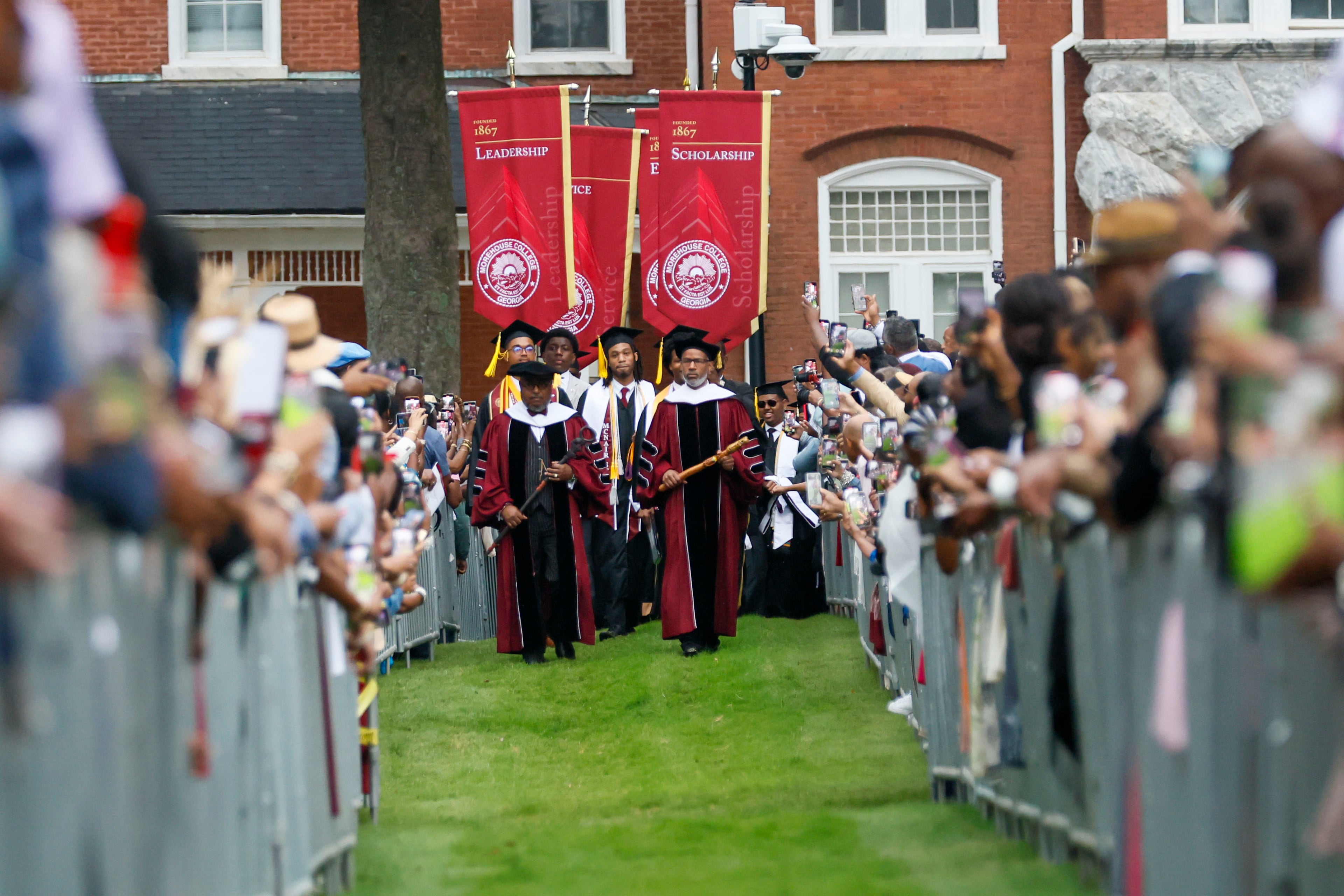 Faculty members lead the procession at the beginning of Morehouse College’s 141st Commencement Ceremony on Sunday, May 18, 2025.
(Miguel Martinez/ AJC)