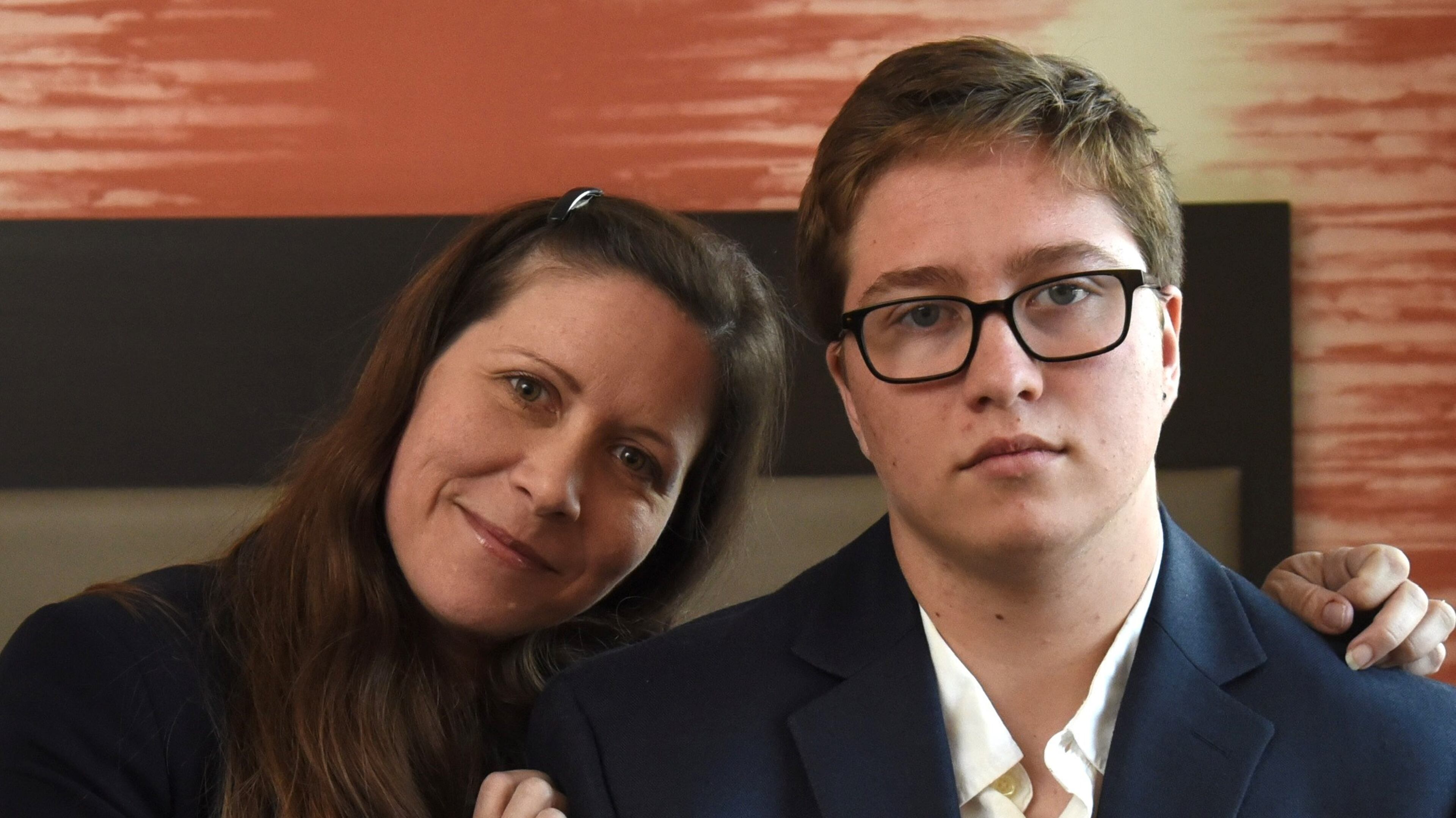 Andrew Adams and his mother, Erica Kasper. (HYOSUB SHIN/Hyosub.Shin@ajc.com)