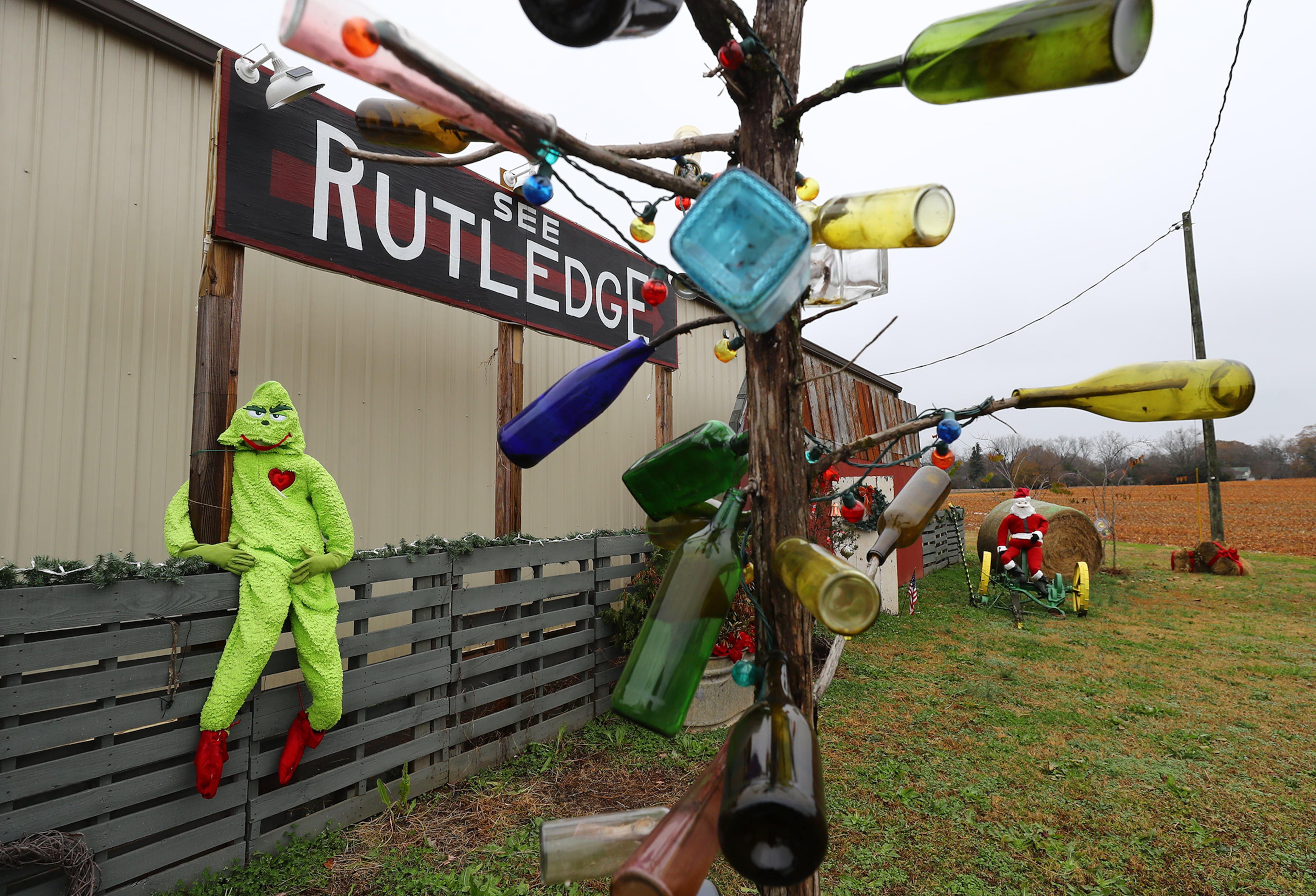 A building that serves as the Rutledge Liquor Store is decorated for Christmas urging passerbys to visit the tiny rural town on Wednesday, Dec 8, 2021. “Curtis Compton / Curtis.Compton@ajc.com”`