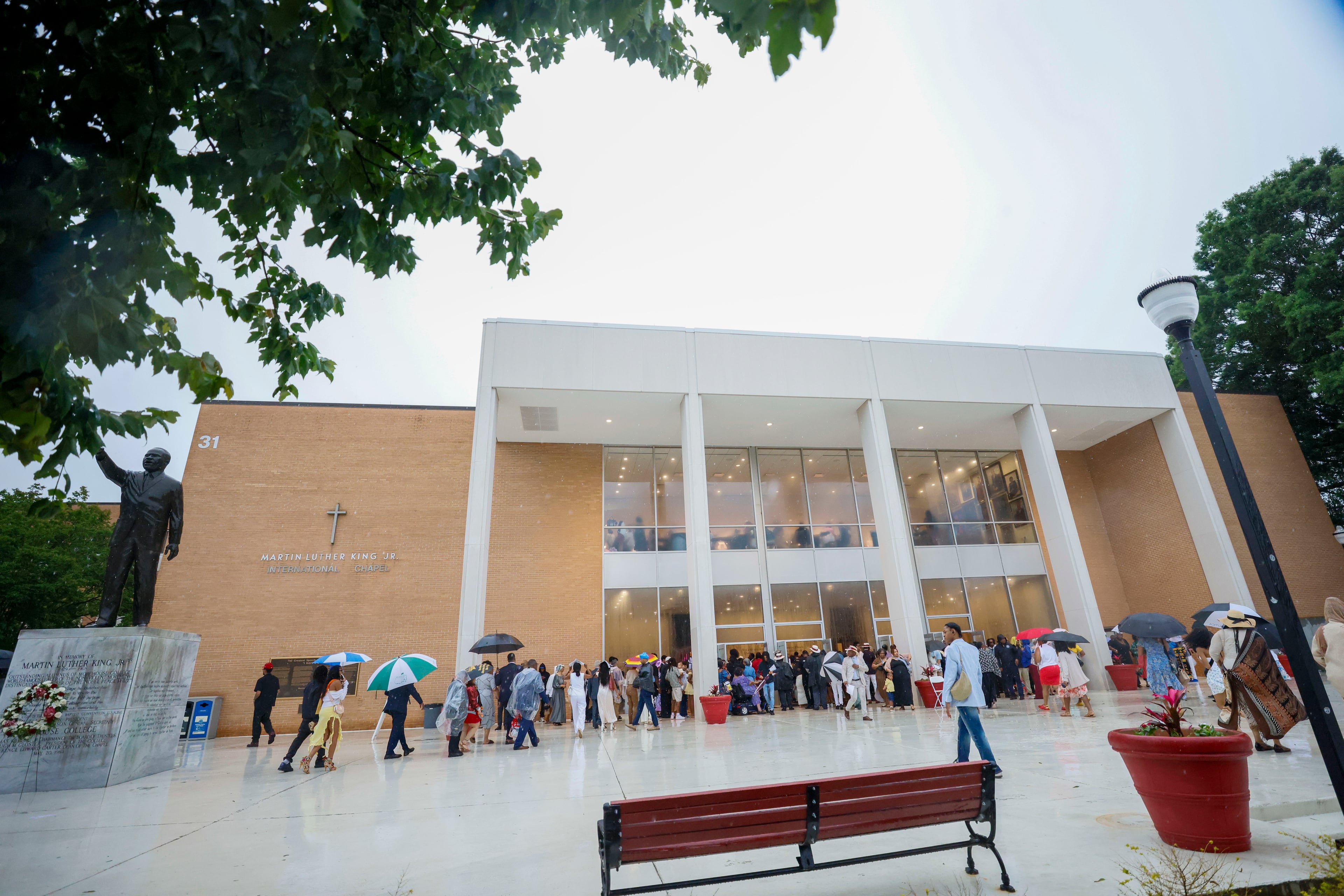 Graduates and their families walk into the Martin Luther King International Chapel due to thunderstorms in the area during Morehouse College’s 141st Commencement Ceremony on Sunday, May 18, 2025.
(Miguel Martinez/ AJC)