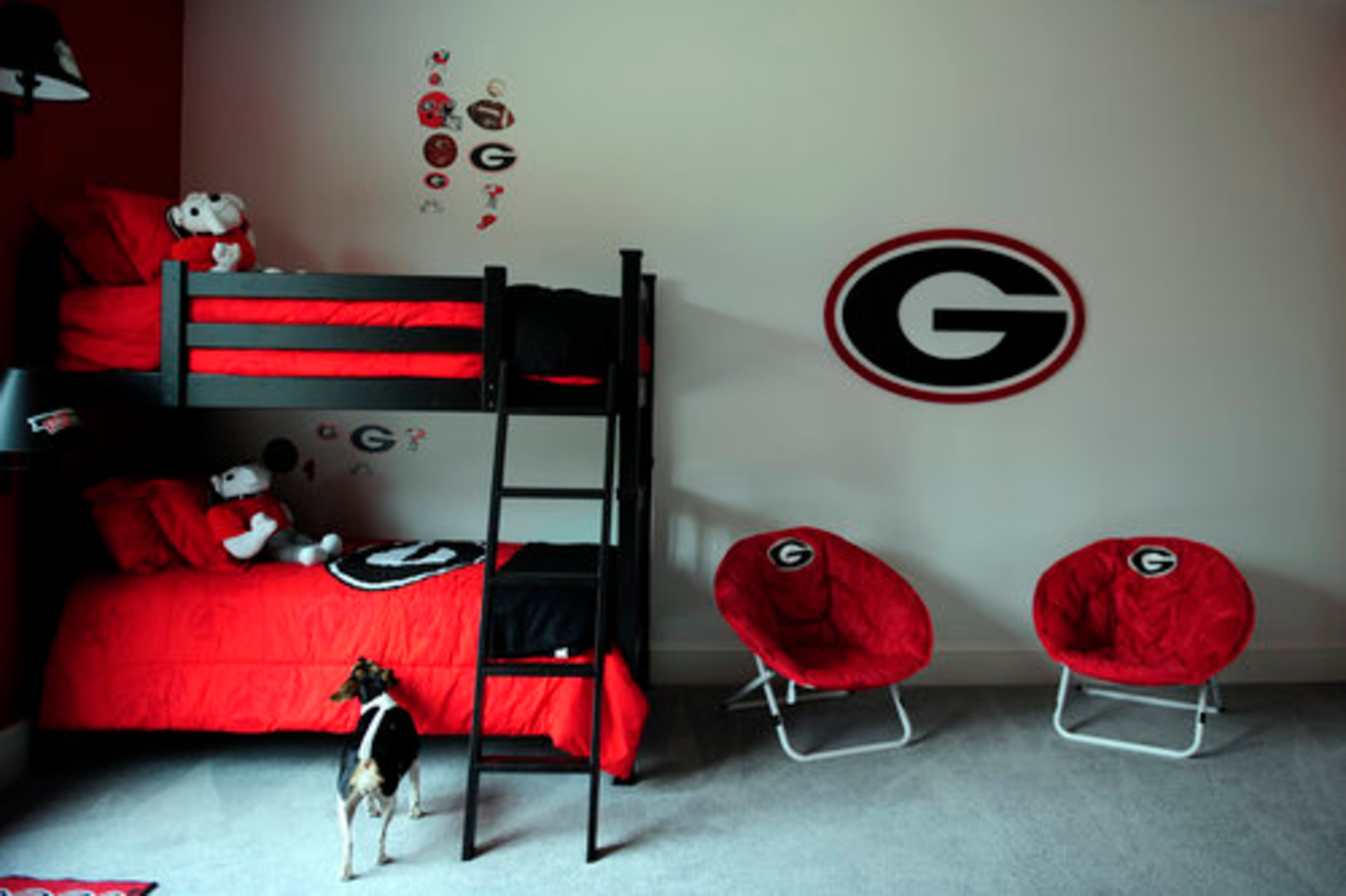 Two sets of bunk beds, decorated in the theme of the Barneses' alma mater, are in the grandsons' room. Right now, there's just Will, who was allowed to decorate with stickers. The extra room means he can have his friends over, Marie says.