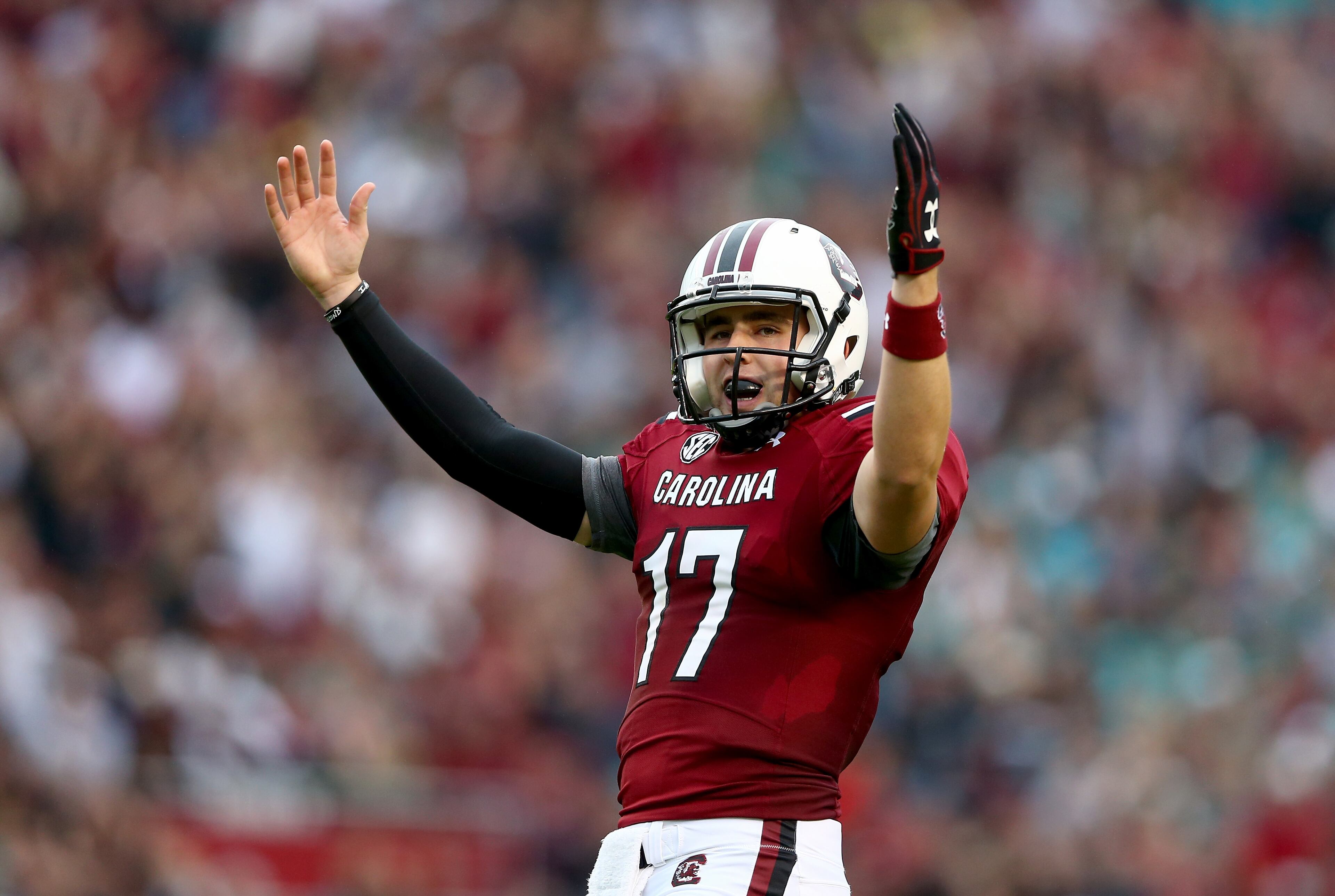 Dylan Thompson #17 of the South Carolina Gamecocks celebrates after throwing a touchdown during their game against the Coastal Carolina Chanticleers at Williams-Brice Stadium on November 23, 2013 in Columbia, South Carolina. (Photo by Streeter Lecka/Getty Images)