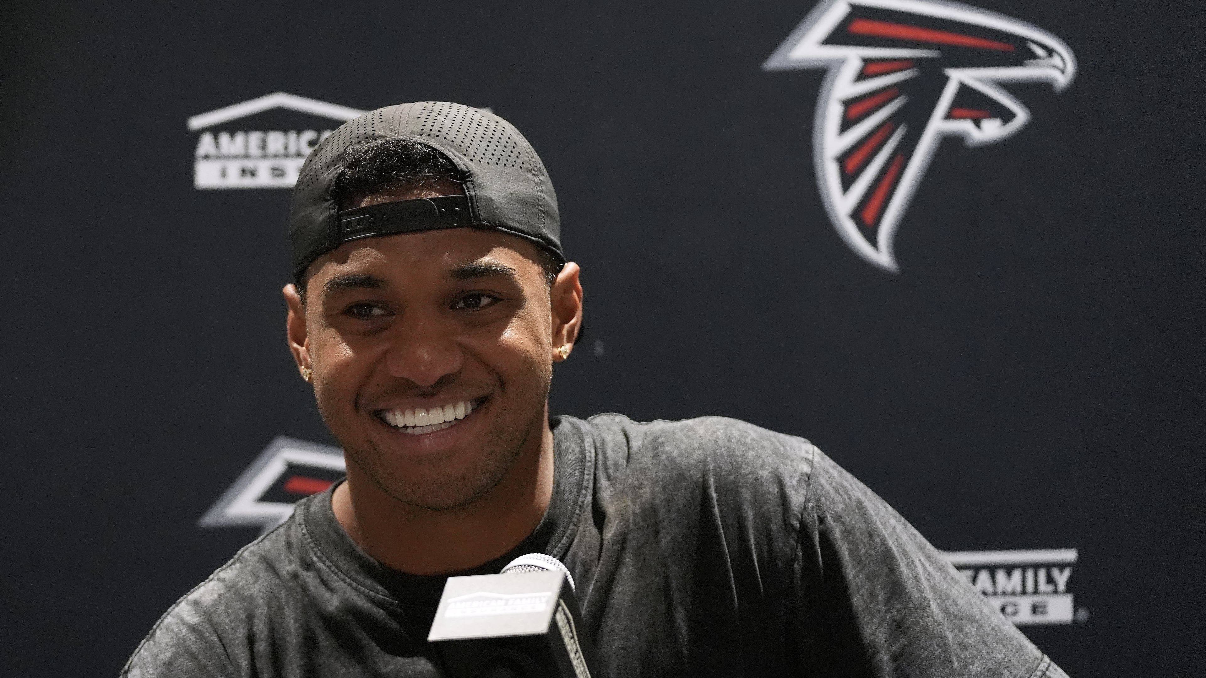Atlanta Falcons quarterback Tua Tagovailoa speaks at a news conference after an NFL preseason football game against the Miami Dolphins, Friday, Aug. 28, 2026, in Miami Gardens, Fla. (AP Photo/Lynne Sladky)