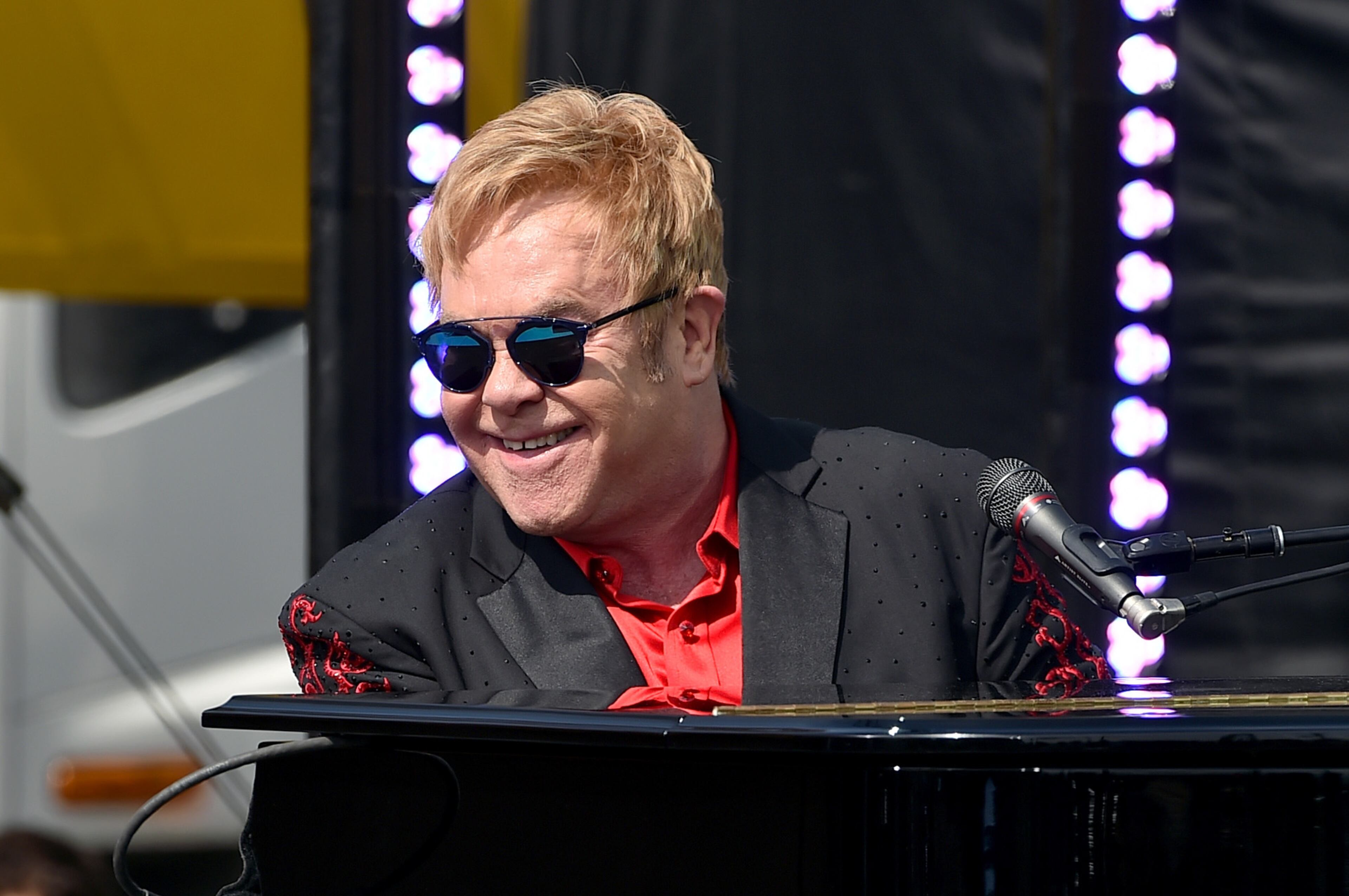 WEST HOLLYWOOD, CA - FEBRUARY 27: Elton John performs live on the Sunset Strip, on February 27, 2016, as a thank you to the City of West Hollywood for their support of the Elton John AIDS Foundation. The concert was streamed live on AOL.com and co-presented by AOL and BBVA. (Photo by Kevin Winter/Getty Images for AOL)