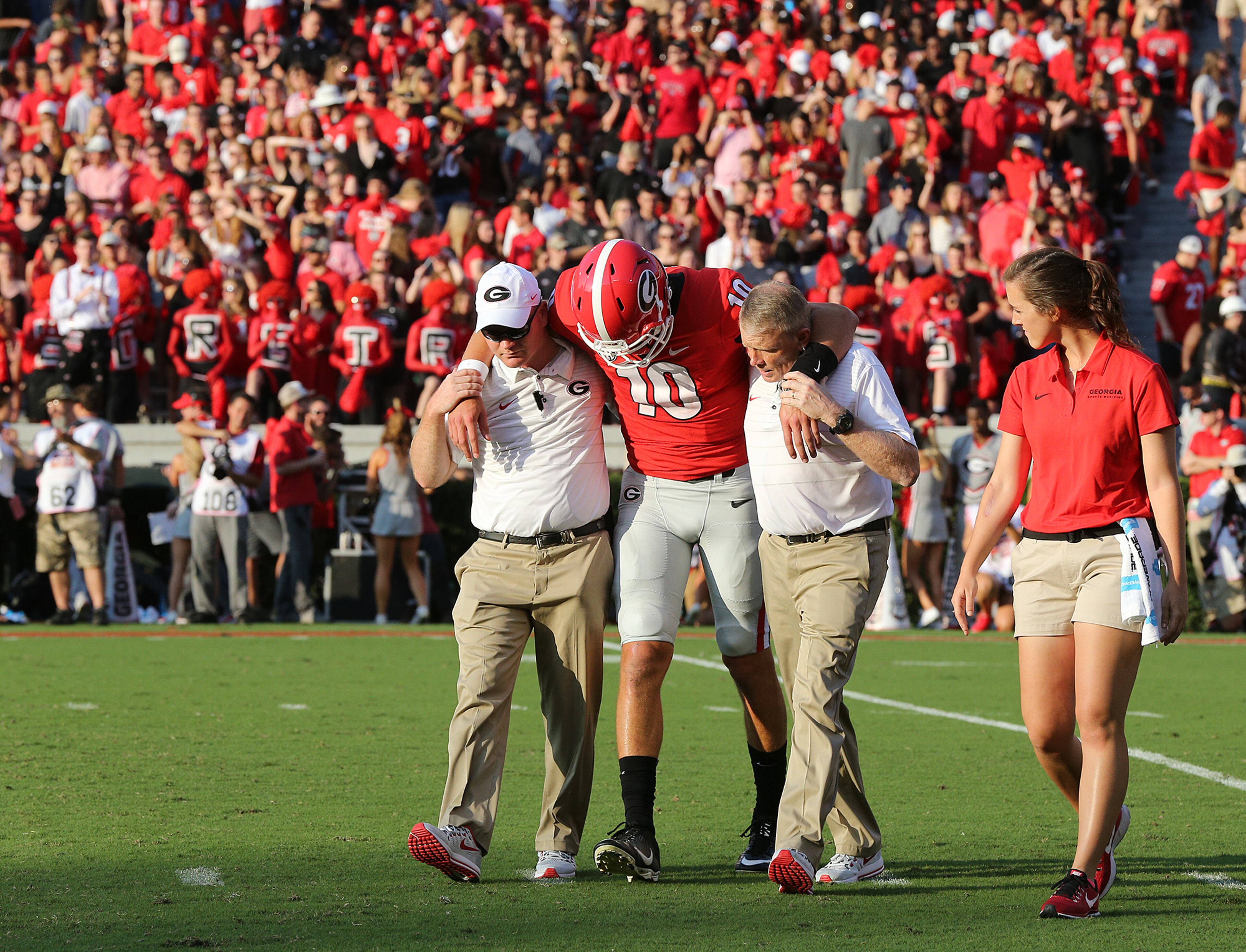 September 2, 2017 Athens: Georgia fans stand in silence as quarterback Jacob Eason leaves the game with an injury during the first quarter against Appalachian State in a NCAA college football game on Saturday, September 2, 2017, in Athens. Curtis Compton/ccompton@ajc.com