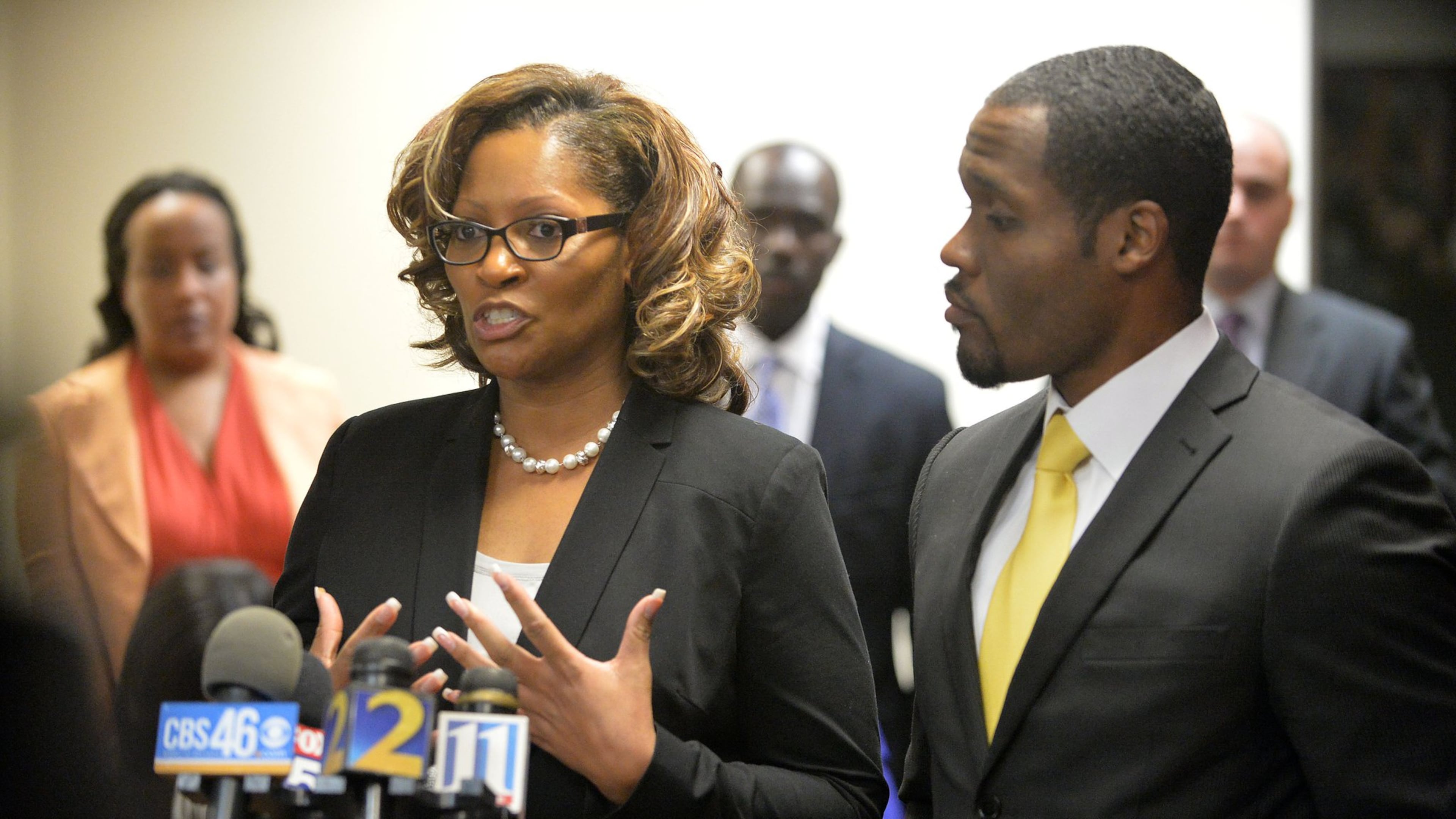 Former Dobbs Elementary teacher Angela Williamson and her defense attorney Gerald Griggs speak during a 2015 press conference in this file photo. KENT D. JOHNSON /KDJOHNSON@AJC.COM
