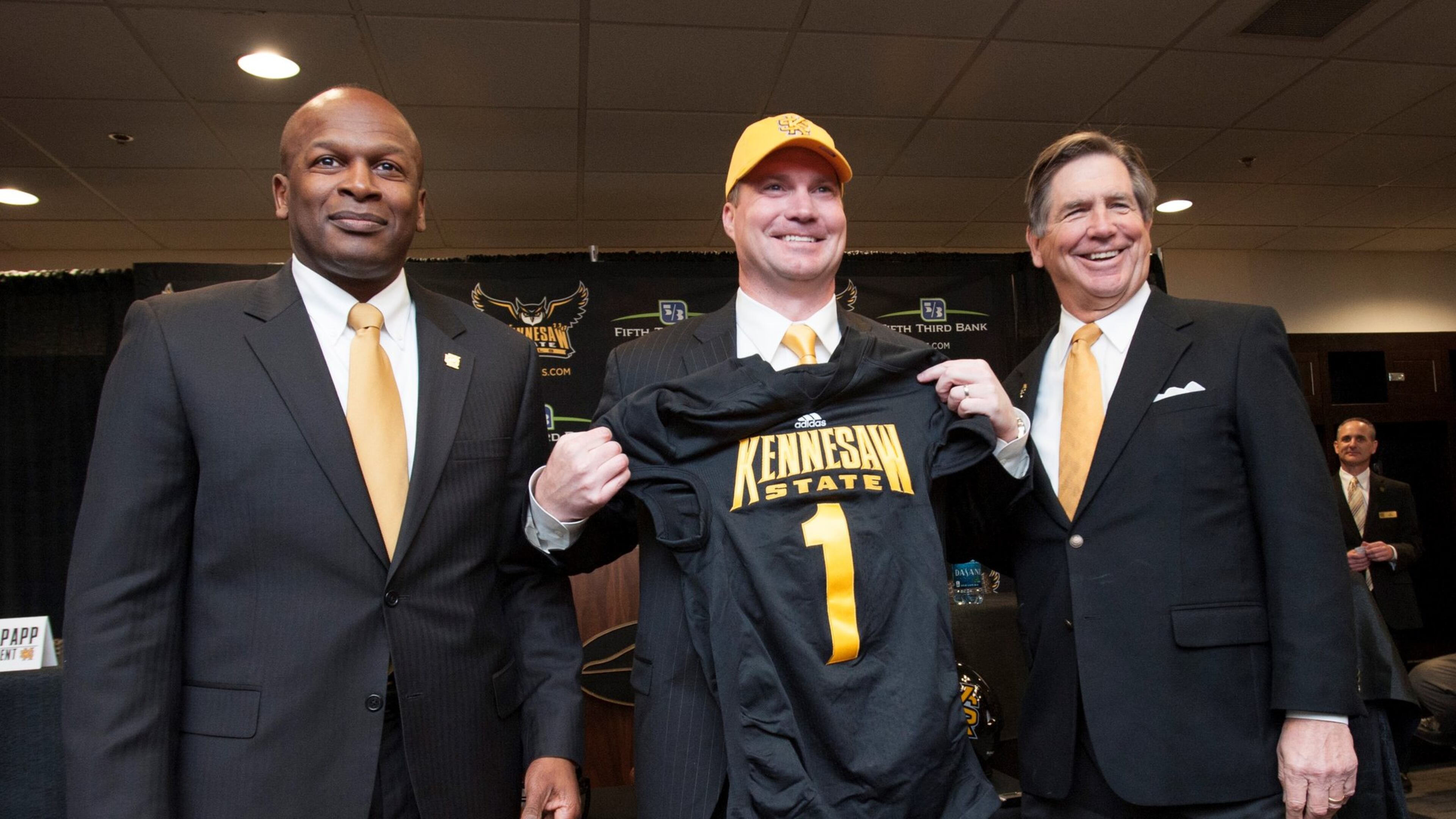The three men most responsible for the fielding of Kennesaw State’s first football team: Athletic director Vaughn Williams, university President Daniel Papp, football coach Brian Bohannon. (Courtesy of KSU)