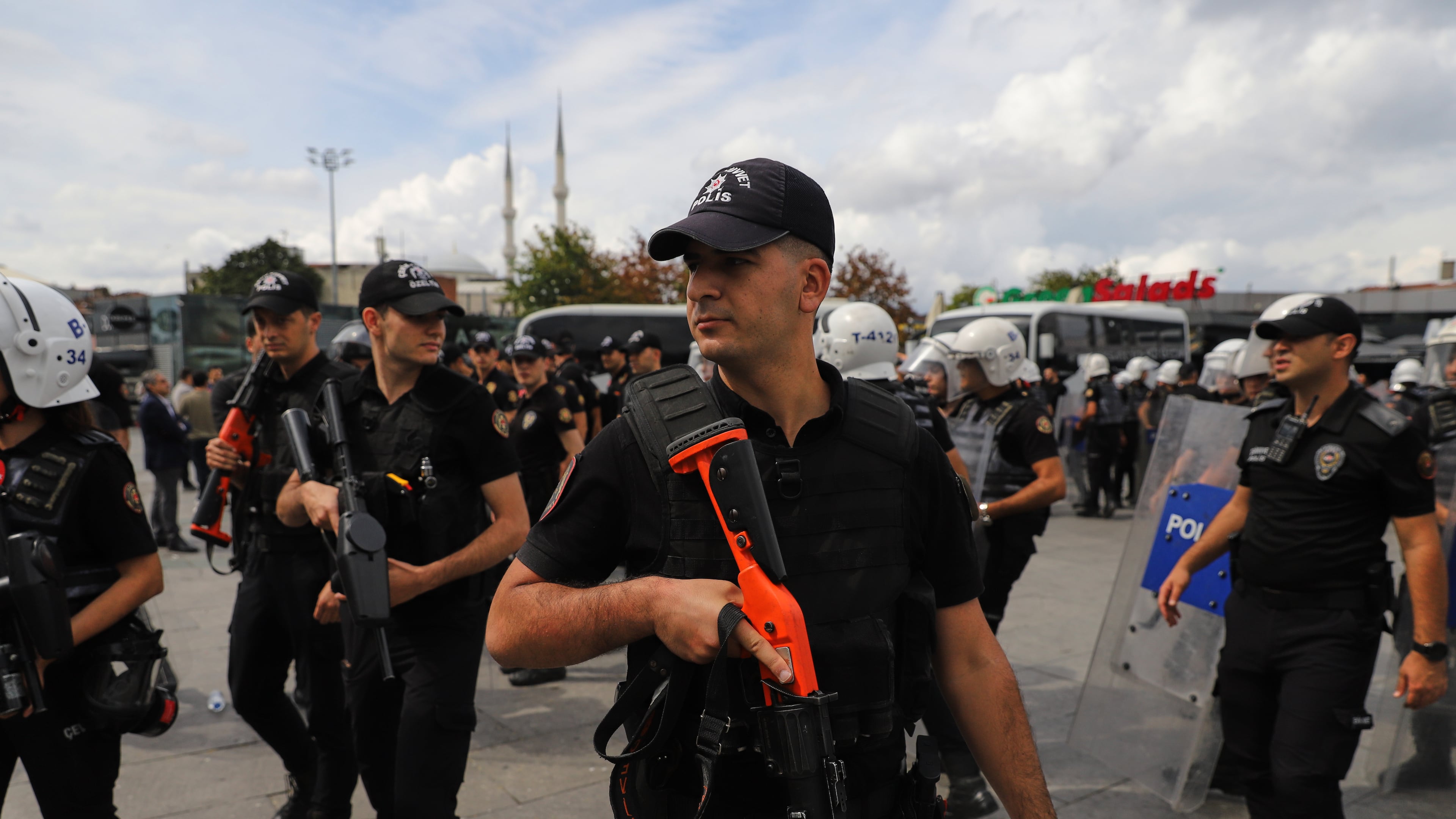 Turkish police stand guard outside a courthouse after preventing LGBTQ+ rights supporters from holding a news conference in Istanbul, Turkey, Tuesday, Sept. 15, 2026. (AP Photo/Dilara Acikgoz)