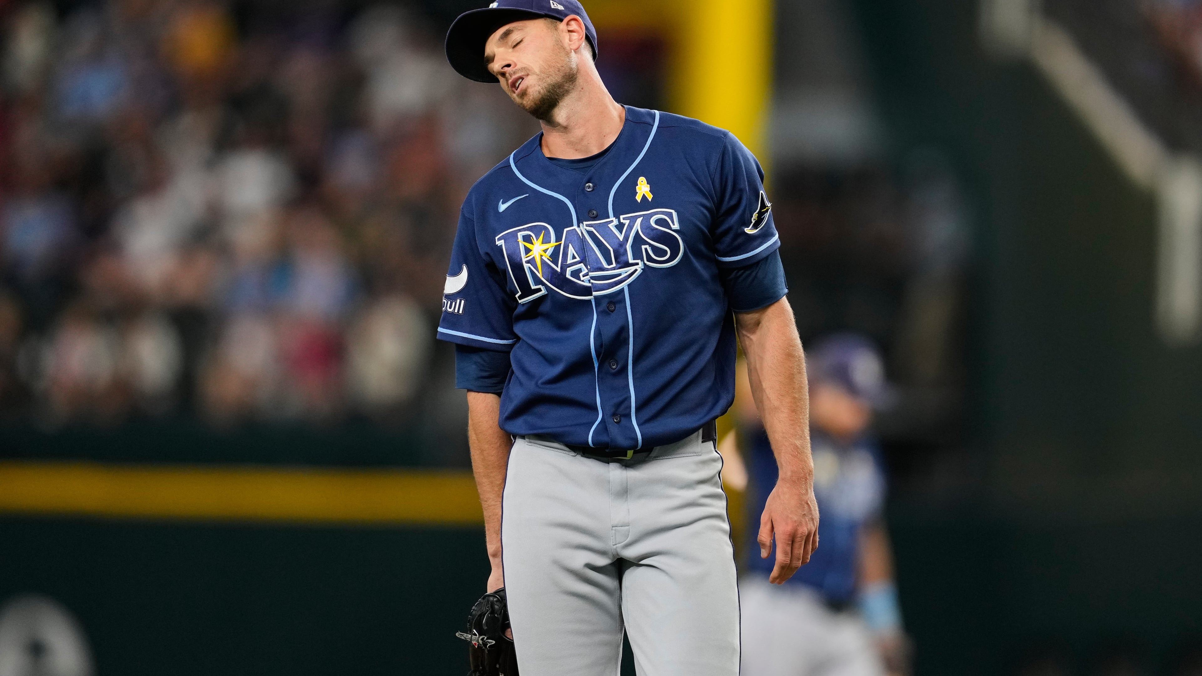 Tampa Bay Rays pitcher Steven Matz turns around on the mound after throwing a pitch to the Texas Rangers during the fifth inning of a baseball game Sunday, Sept. 6, 2026, in Arlington, Texas. (AP Photo/Tony Gutierrez)