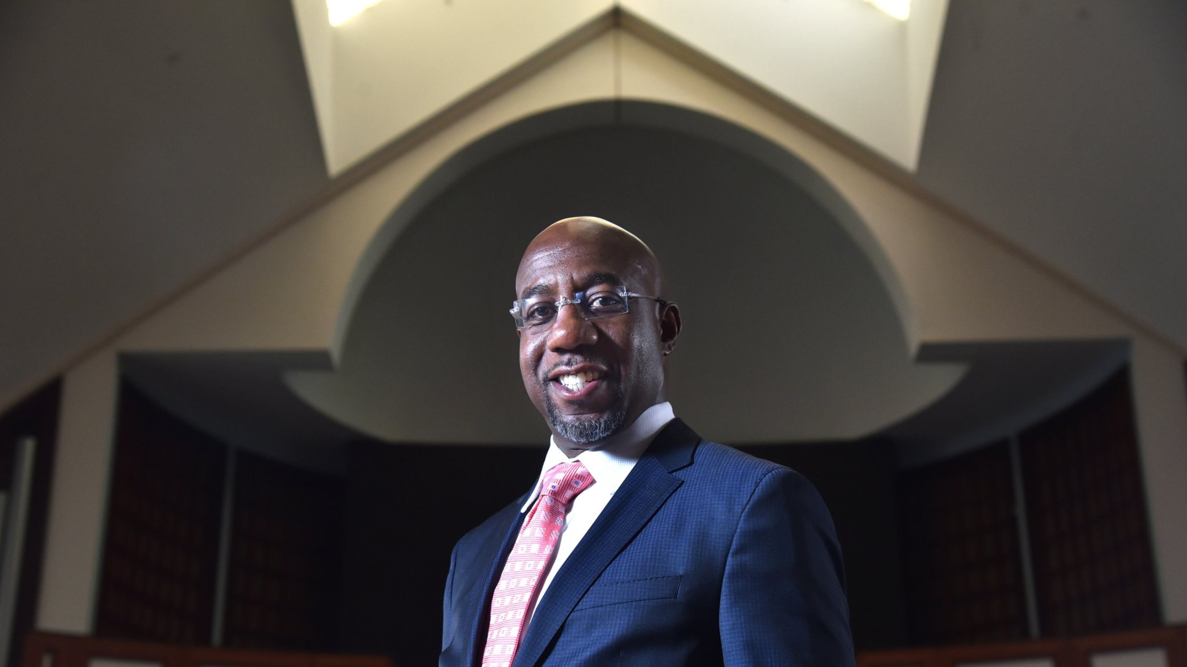 July 18, 2019 Atlanta - Portrait of Rev. Raphael Warnock at the Historic Ebenezer Baptist Church on Thursday, July 18, 2019. The Rev. Raphael G. Warnock has had busy couple of weeks. After co-hosting a conference on ending mass incarceration in the United States, he was off to Baltimore. And less than 24 hours ago, he was back at Ebenezer for the 45th annual scholarship concert honoring the memory of the late Christine Williams King, affectionately known as Mama King, who was assassinated there 45 years ago. HYOSUB SHIN / HYOSUB.SHIN@AJC.COM