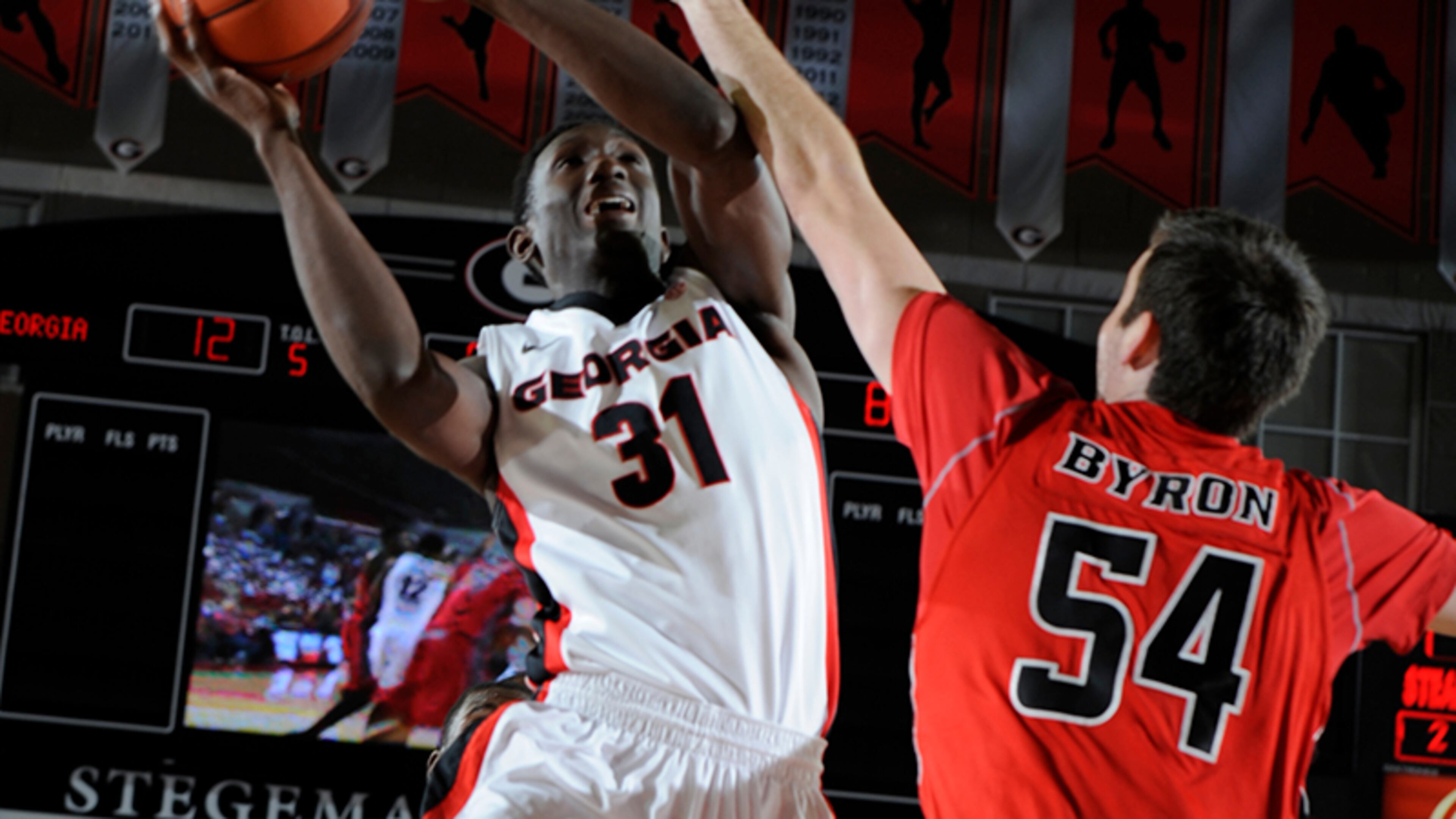 Georgia's Brandon Morris (31) adjusts his shot over a Gardner-Webb defender for 2 of his 6 points off the bench Thursday.