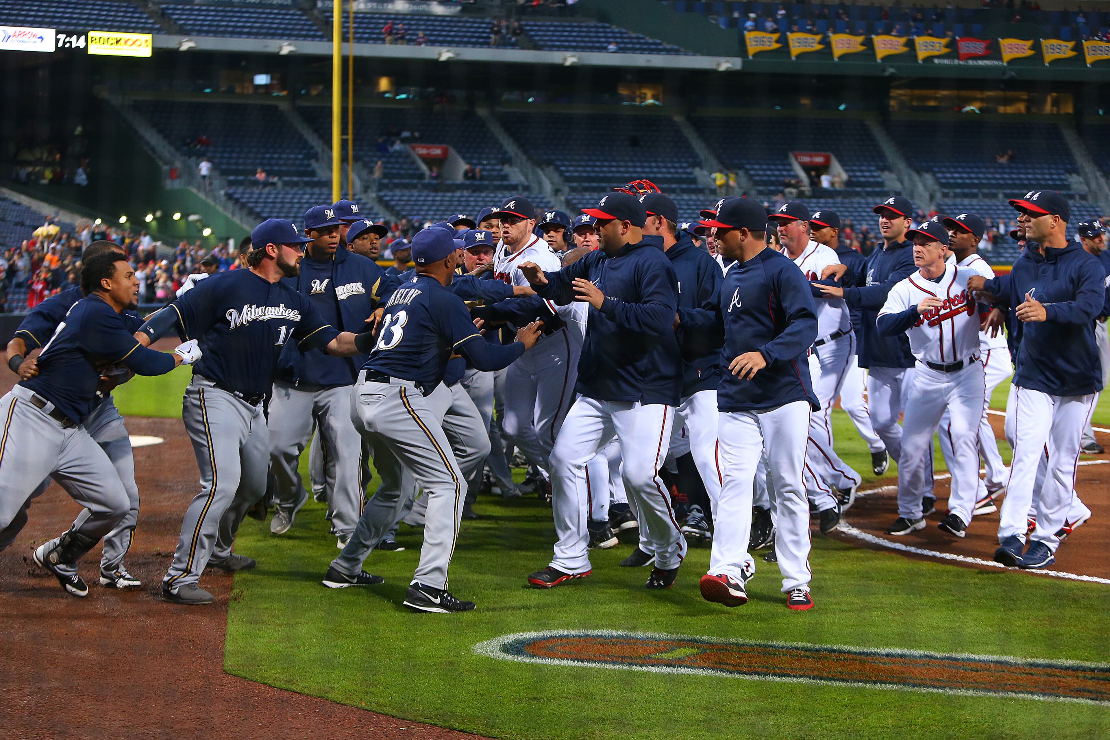 Both benches clear when Braves catcher Brian McCann confronts Brewers batter Carlos Gomez for show boating Braves pitcher Paul Maholm ona solo home run during the first inning on Wednesday, Sept. 25, 2013, in Atlanta.