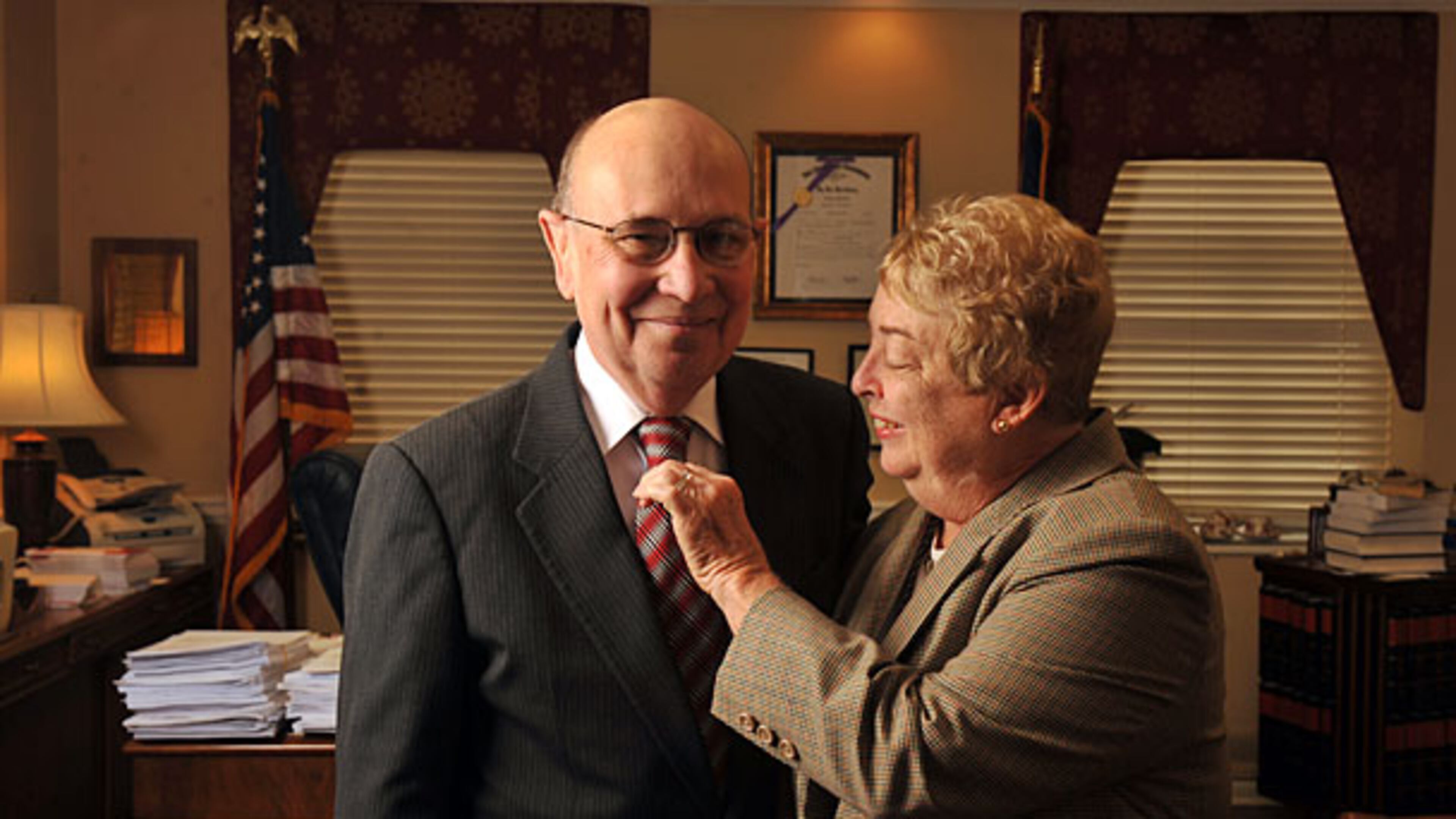 Georgia Supreme Court Presiding Judge George Carley, with wife Sandy, is well known for always wearing a coat and tie, including bringing backup ties to Georgia football games in case the first one proves unlucky.