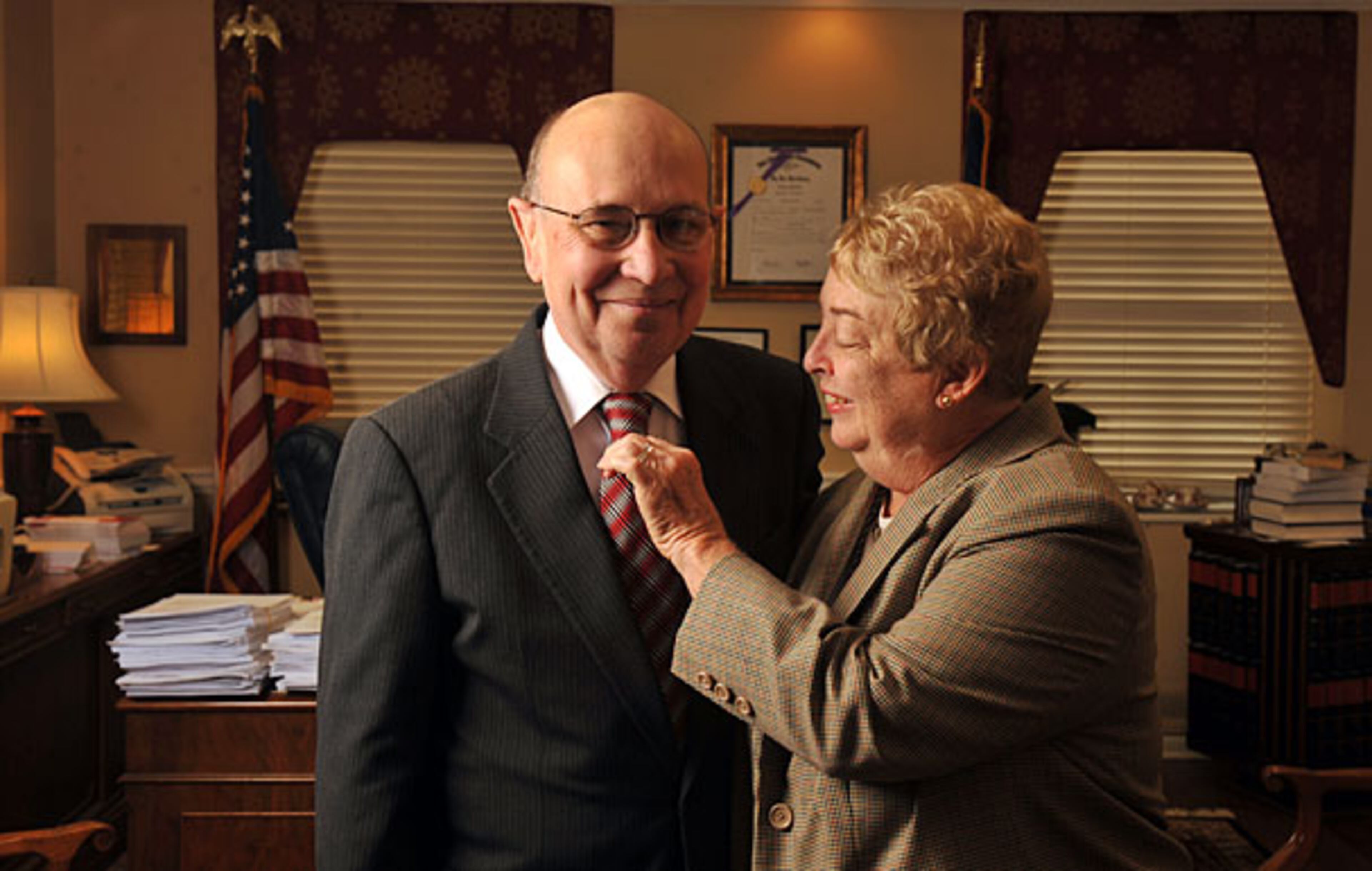 George Carley (shown with wife Sandy) was well known for always wearing a coat and tie. (AJC FILE)