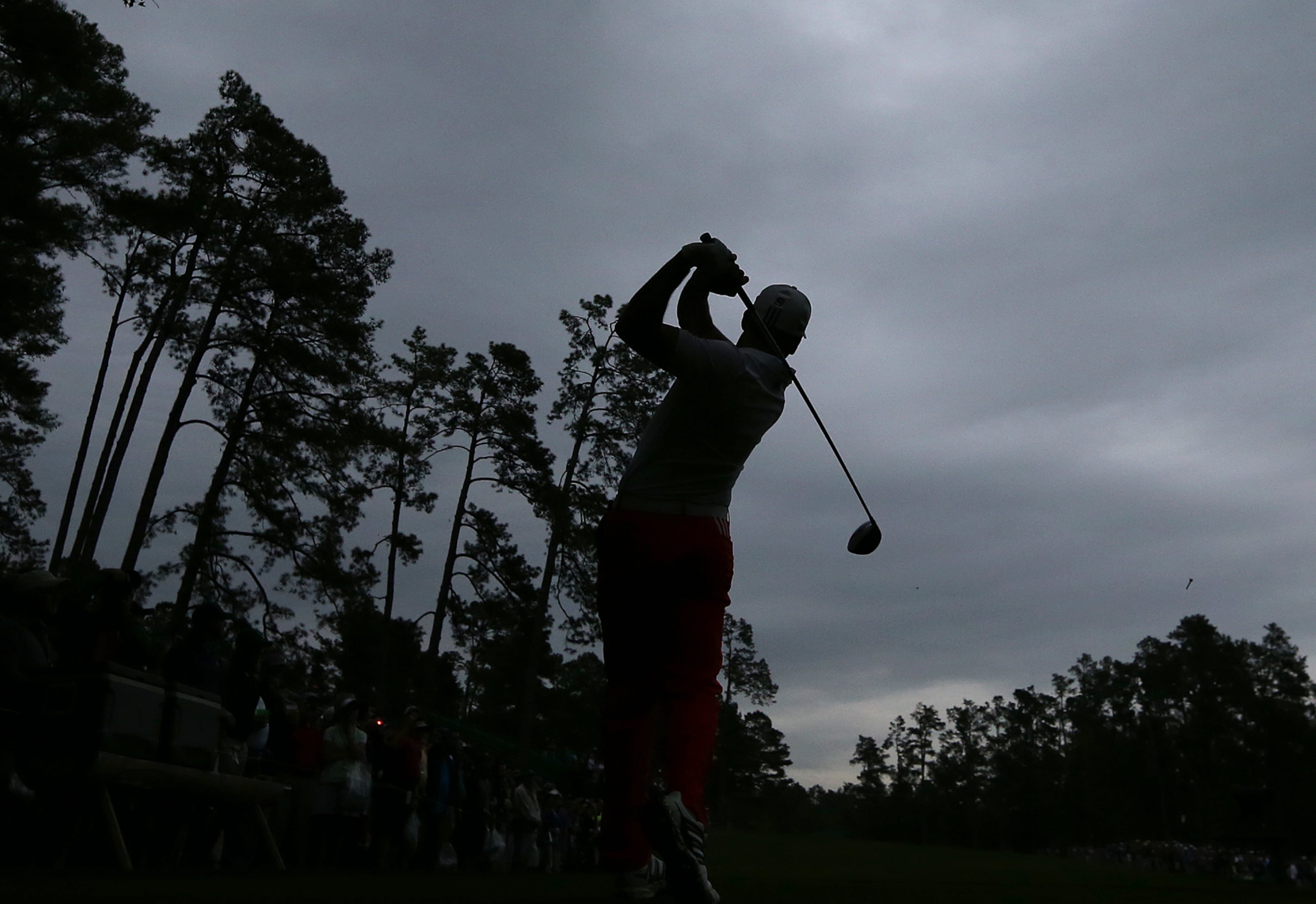 April 5, 2017, Augusta: Sergio Garcia tees off on the 14th hole beneath a stormy sky just before play was suspended during his practice round for the Masters at Augusta National Golf Club on Wednesday, April 5, 2017, in Augusta. Curtis Compton/ccompton@ajc.com