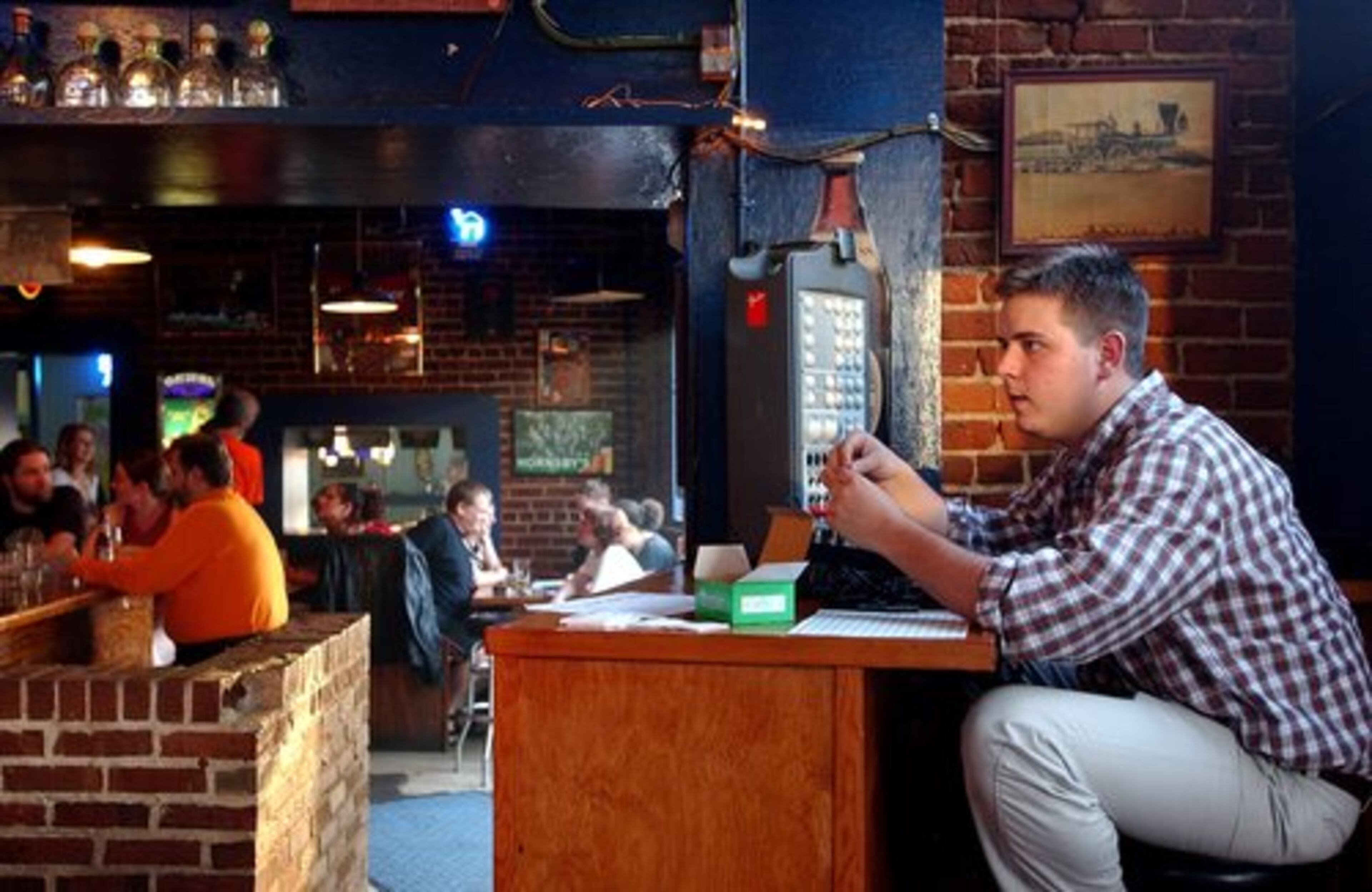 Team trivia competition was part of Trackside Tavern's draw also. In this 2002 photo, Bruce Launey gets ready to begin competition.