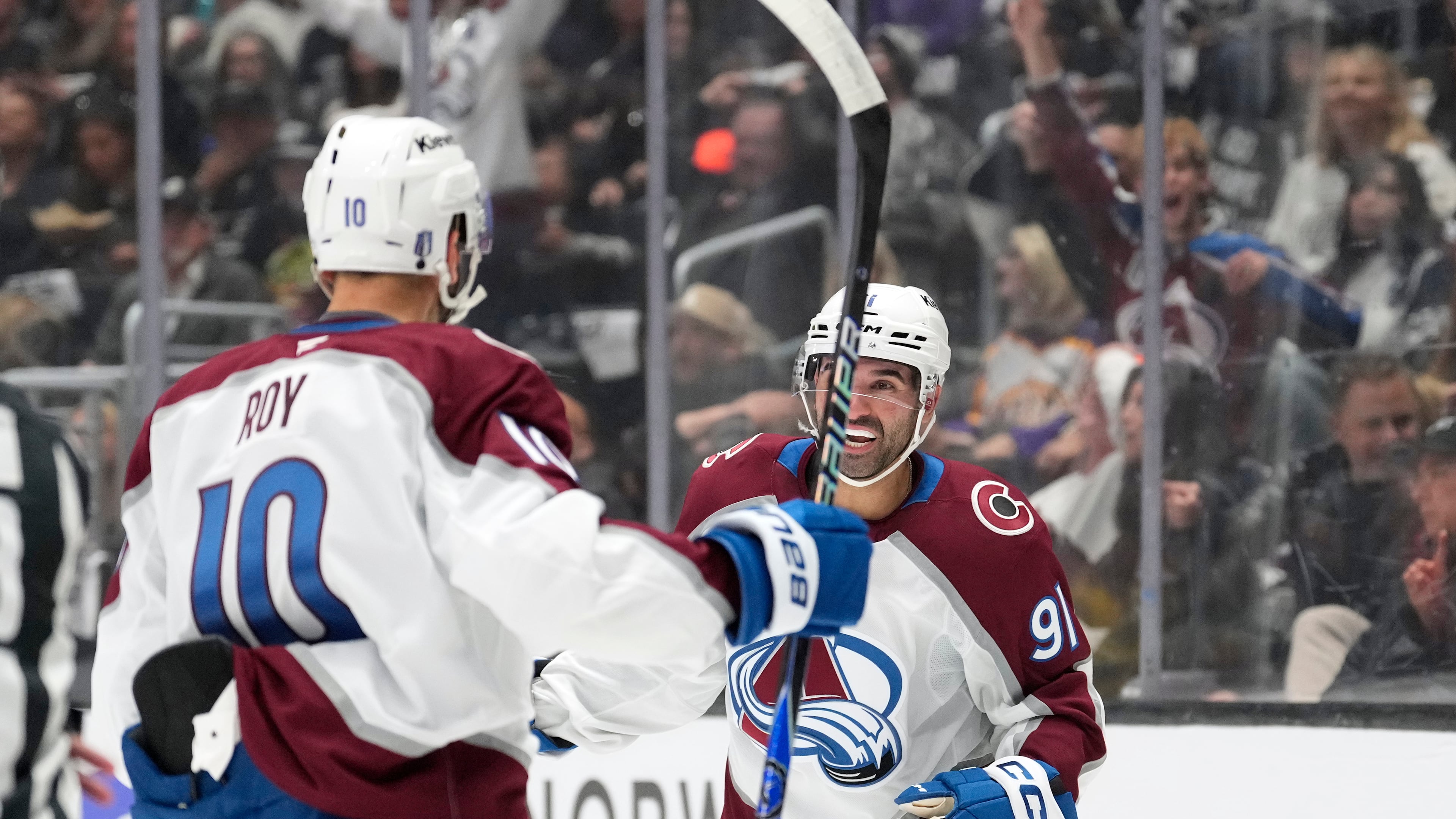 Colorado Avalanche center Nazem Kadri, right, celebrates his goal with center Nicolas Roy during the first period of Game 3 in the first round of the NHL hockey Stanley Cup playoffs against the Los Angeles Kings, Thursday, April 23, 2026, in Los Angeles. (AP Photo/Mark J. Terrill)