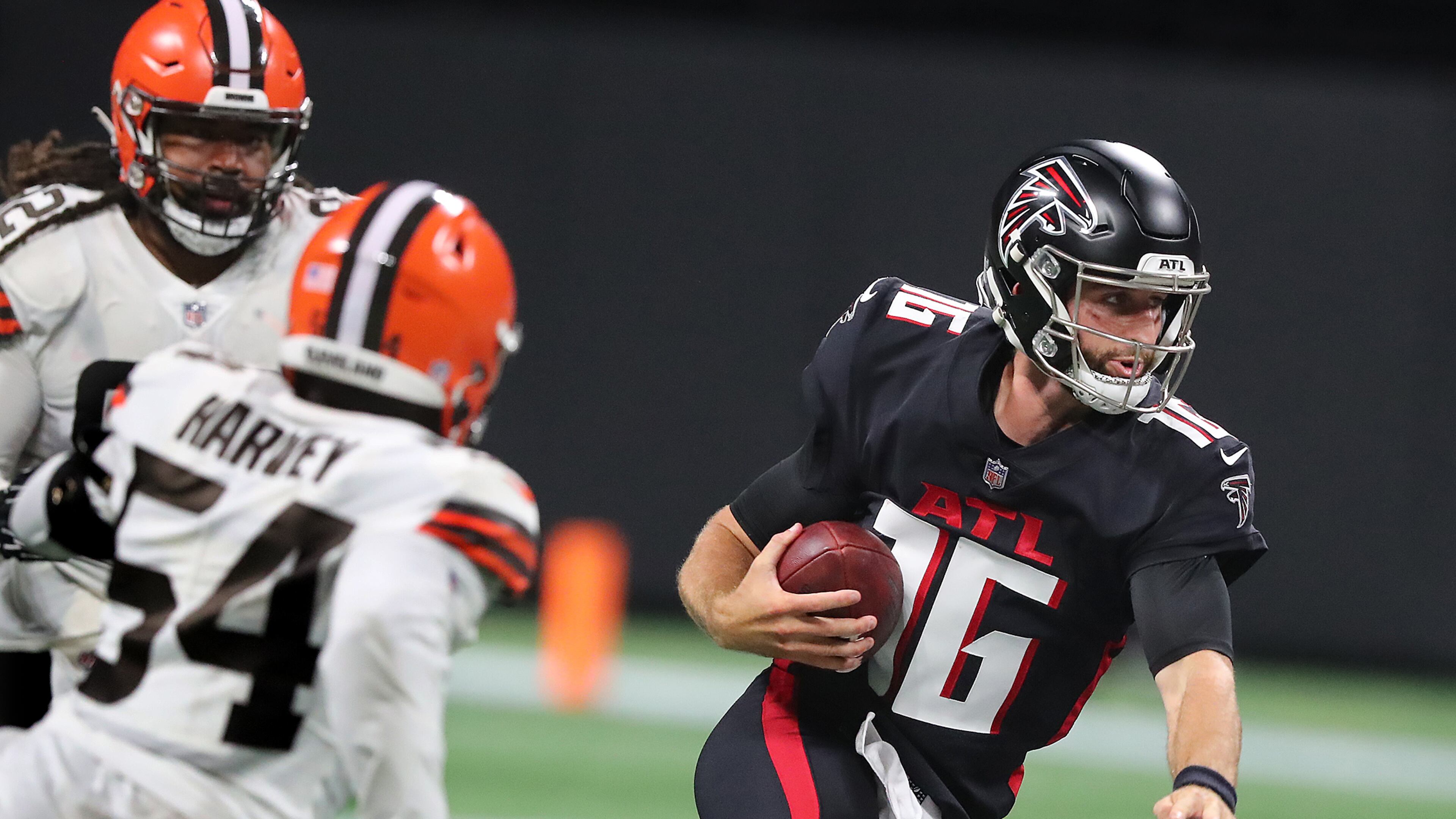 082921 Atlanta: Atlanta Falcons backup quarterback Josh Rosen avoids the pressure from Cleveland Browns defenders breaking loose for yardage during the second half in a NFL preseason football game on Sunday, August 29, 2021, in Atlanta. “Curtis Compton / Curtis.Compton@ajc.com”