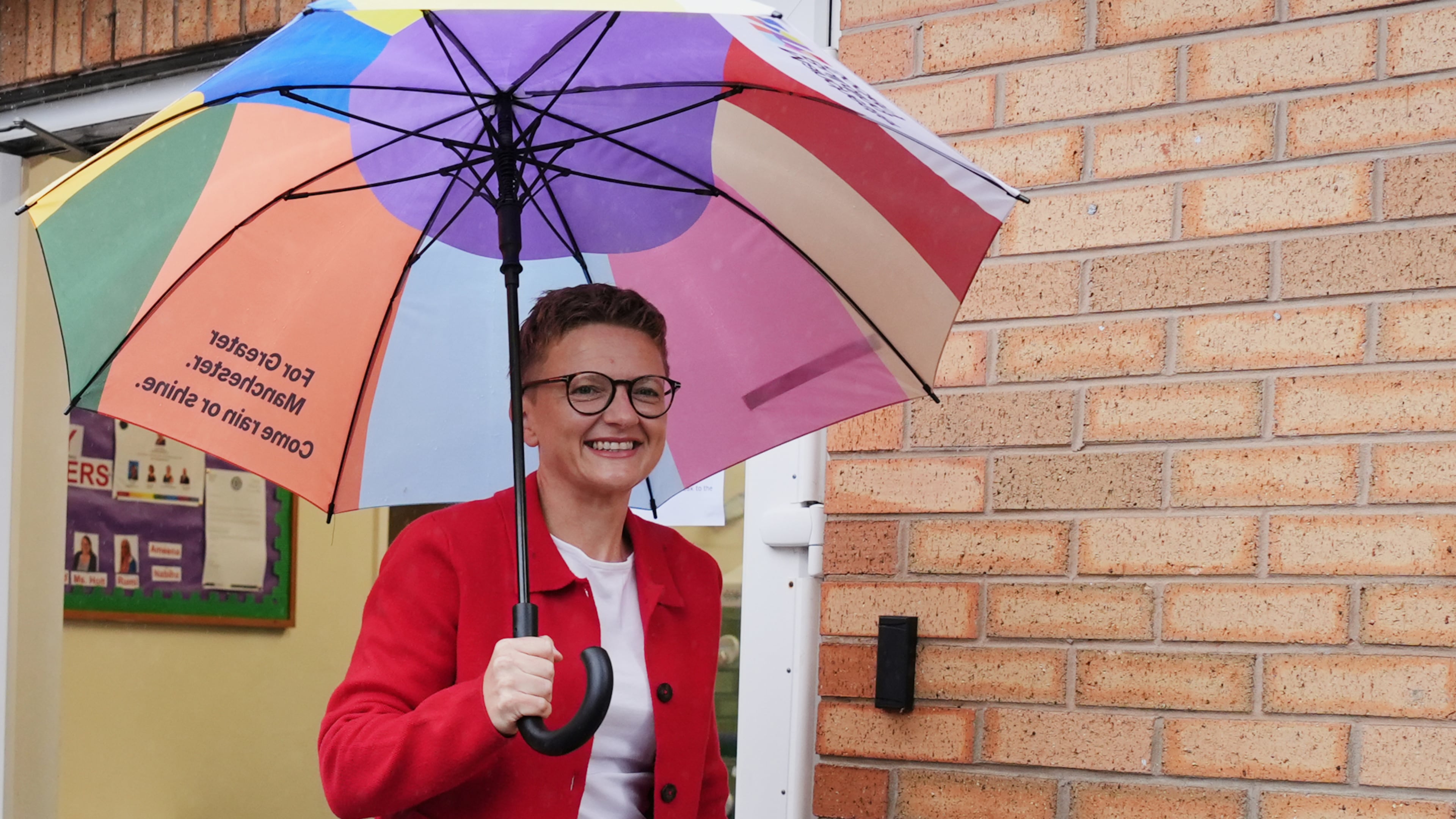 Bev Craig, the Labour Party candidate, departs Broad Oak Primary in Didsbury after voting in the Greater Manchester mayoral by-election, in Manchester, England, Thursday July 30, 2026. (Annabelle Lee-Ellis/PA via AP)