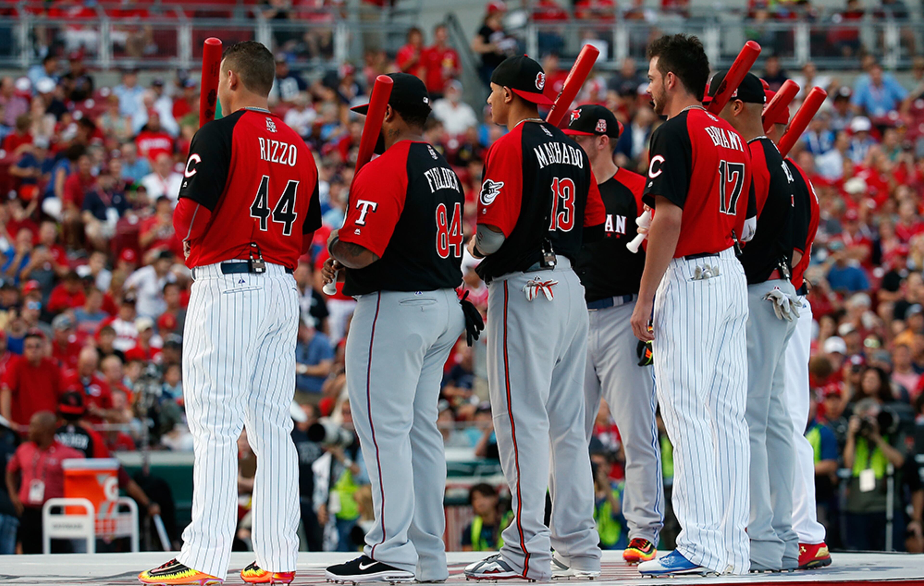 National League All-Star Anthony Rizzo (from left), American League All-Stars Prince Fielder and Manny Machado, and National League All-Star Kris Bryant look on during the national anthem prior to the Home Run Derby at the Great American Ball Park on July 13, 2015, in Cincinnati.