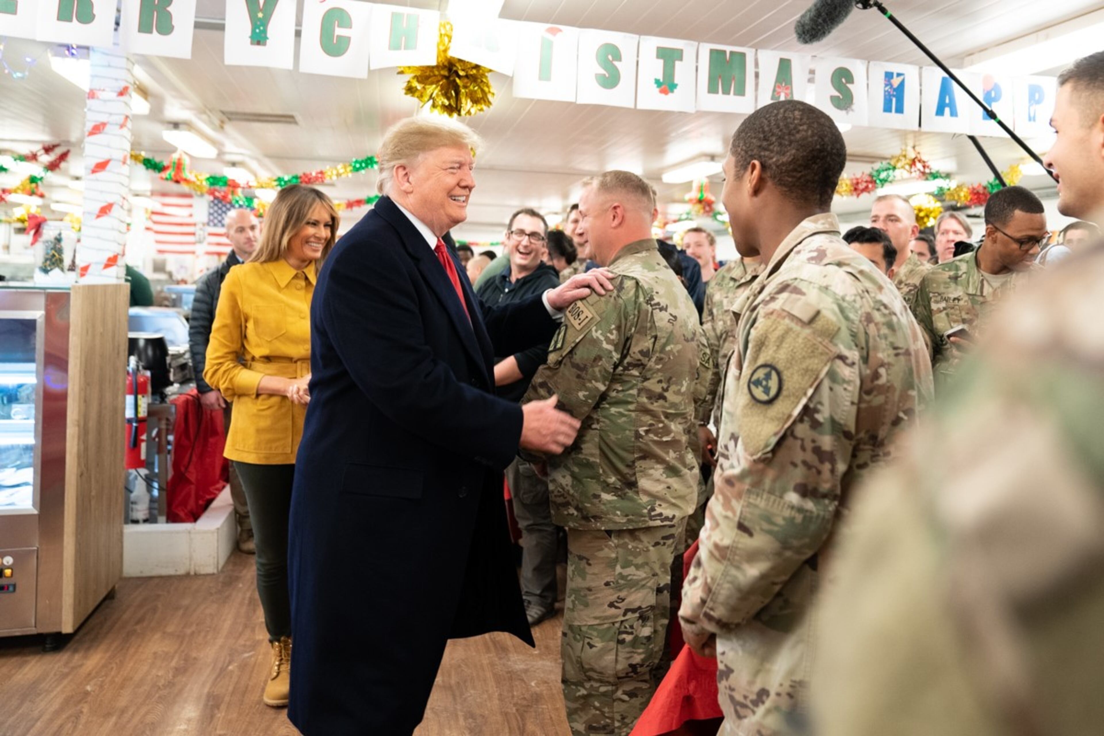 President Donald J. Trump and First Lady Melania Trump shake hands and speak with U.S. troops Wednesday, December 26, 2018, at the Al-Asad Airbase in Iraq.