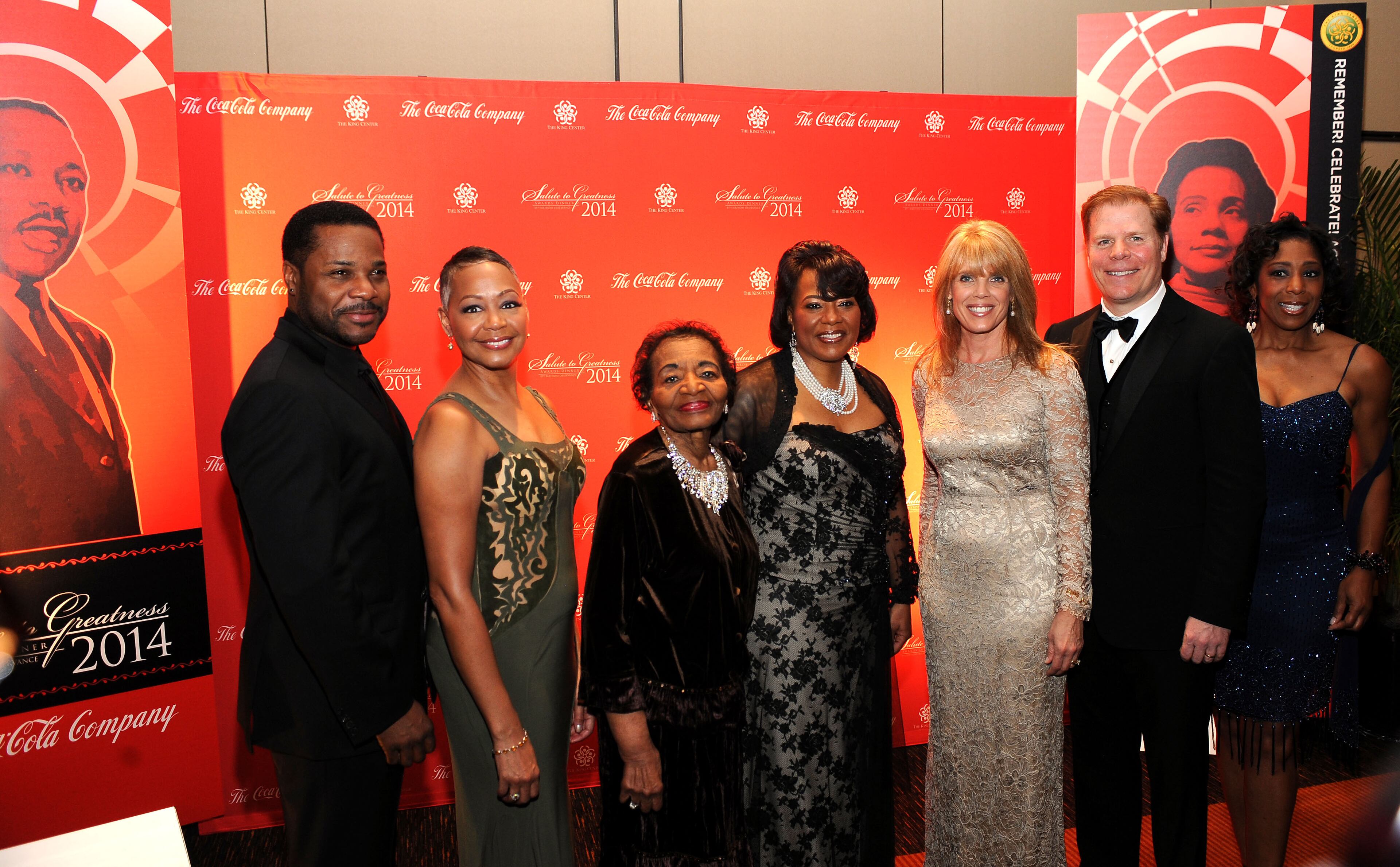 Salute to Greatness Awards Dinner hosts and organizers, from right to left, Dawnn Lewis, Rutherford Seydel, Laura Turner Seydel, Bernice King, Christine King Farris, Lisa Borders and Malcolm Jamal Warner pose for a photo at the VIP reception for the annual Salute to Greatness Awards Dinner honoring Martin Luther King Jr. on Jan. 18, 2014, in Atlanta.