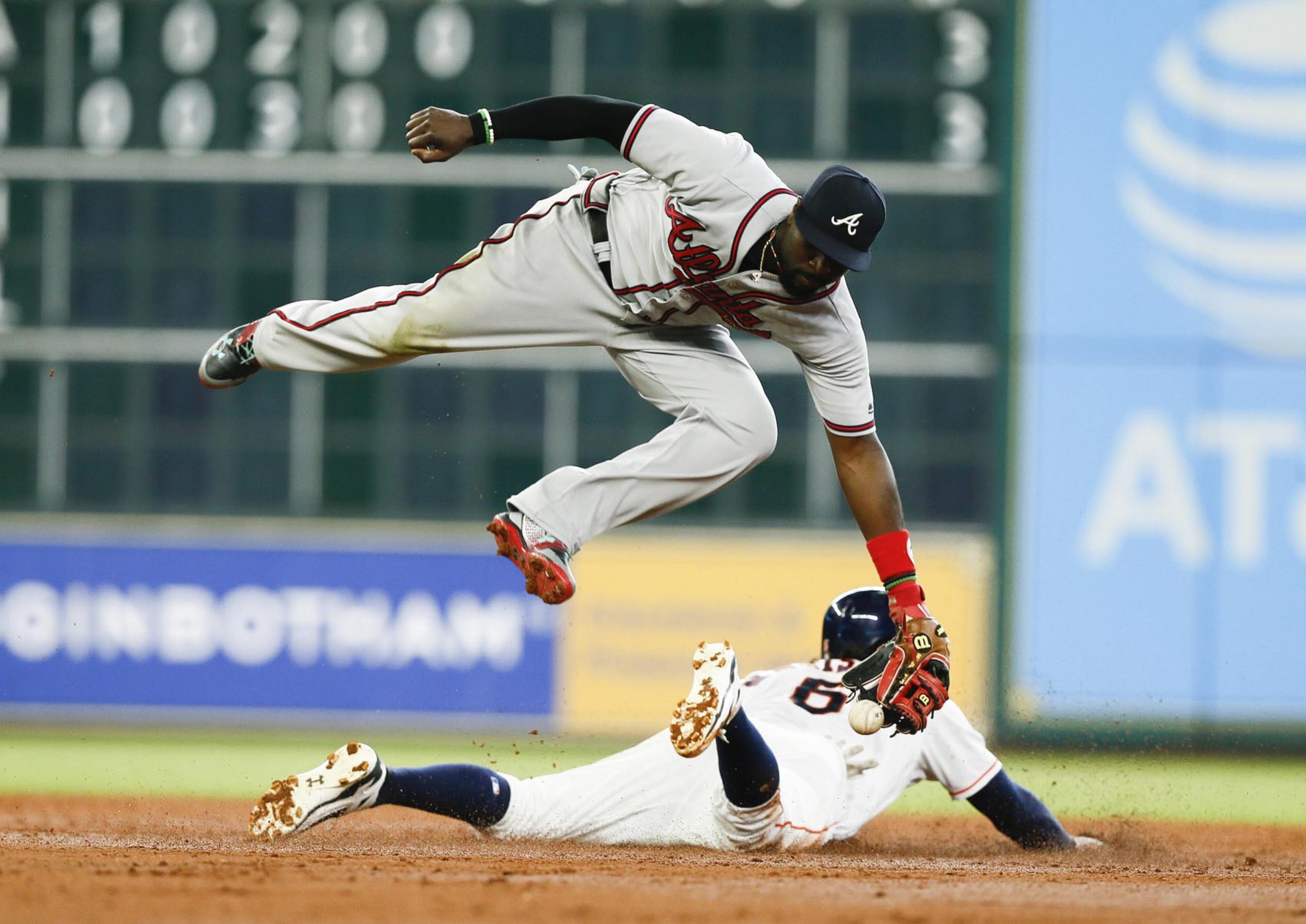 HOUSTON, TX - MAY 10: Houston Astros center fielder Jake Marisnick #6 steals second base in the third inning as Atlanta Braves second baseman Brandon Phillips #4 can't handle the throw at Minute Maid Park on May 10, 2017 in Houston, Texas. (Photo by Bob Levey/Getty Images) *** BESTPIX ***