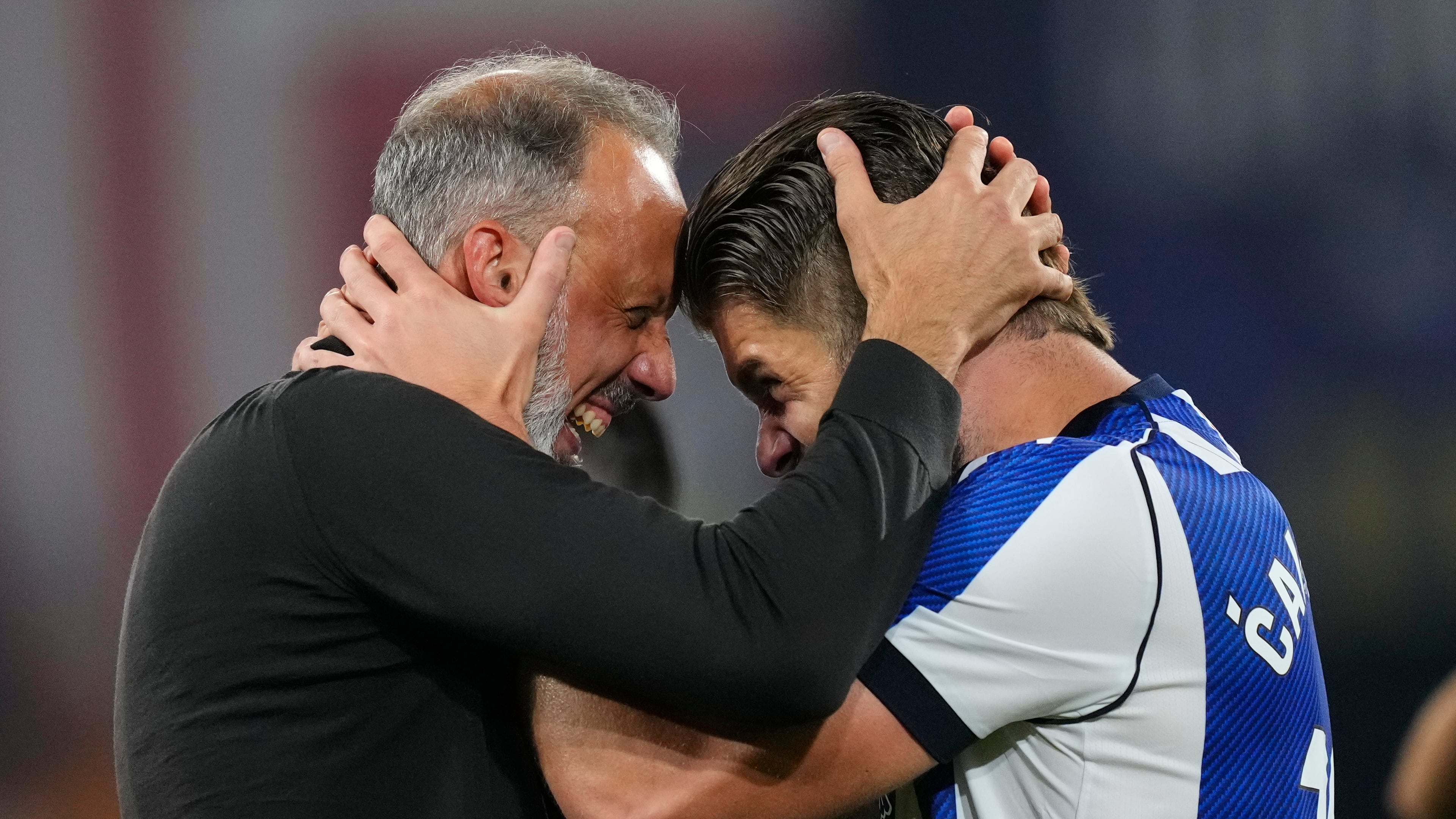 Real Sociedad's head coach Pellegrino Matarazzo, right, celebrates with Duje Caleta-Car after winning the Copa del Rey final soccer match between Atletico Madrid and Real Sociedad in Seville, Spain, Saturday, April. 18, 2026. (AP Photo/Jose Breton)