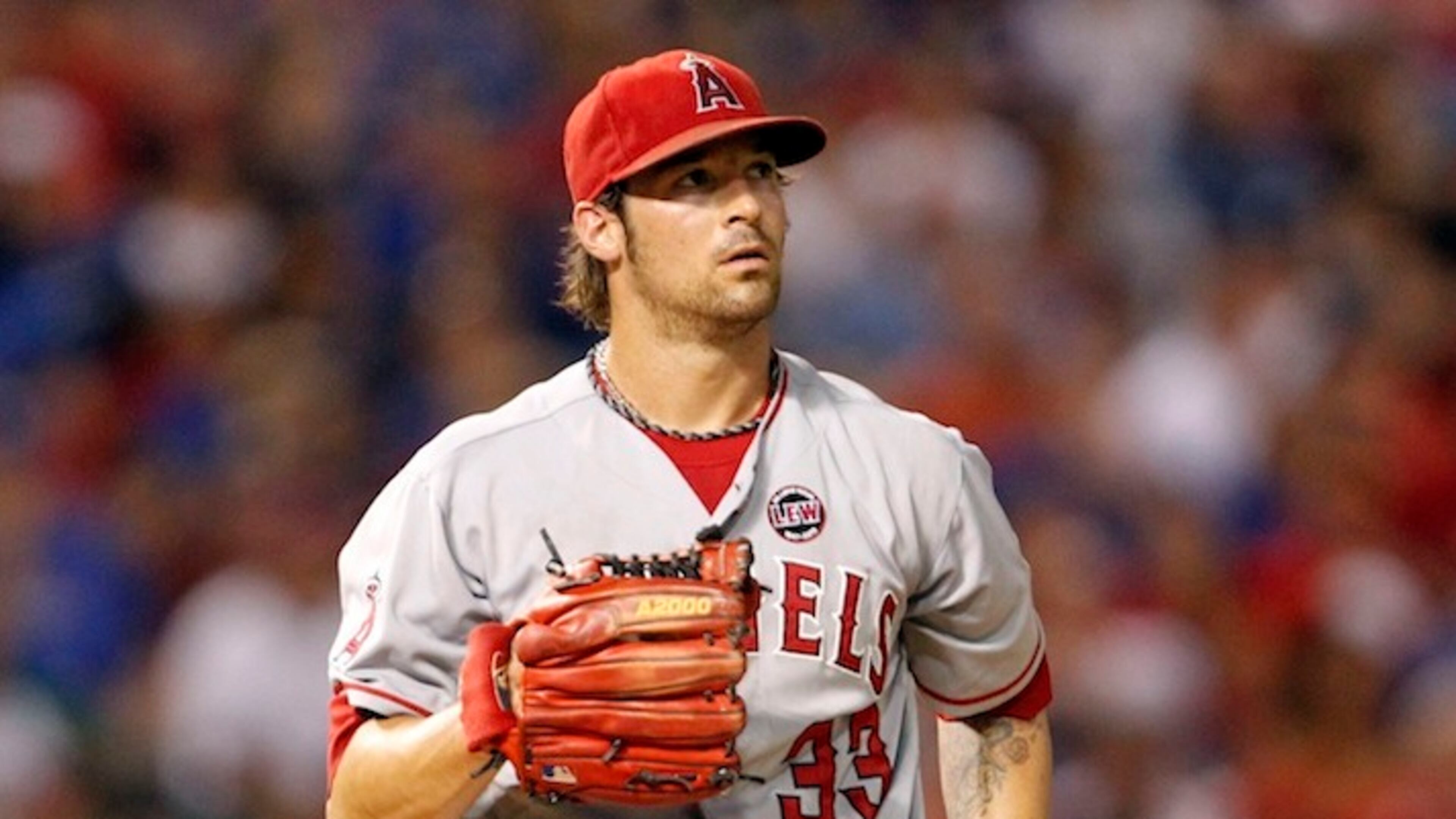 The Los Angeles Angels' C.J. Wilson reacts after giving up a run in the third inning against the Texas Rangers at the Rangers Ballpark in Arlington on Tuesday, July 30, 2013, in Arlington, Texas. (Ron Jenkins/Fort Worth Star-Telegram/MCT)