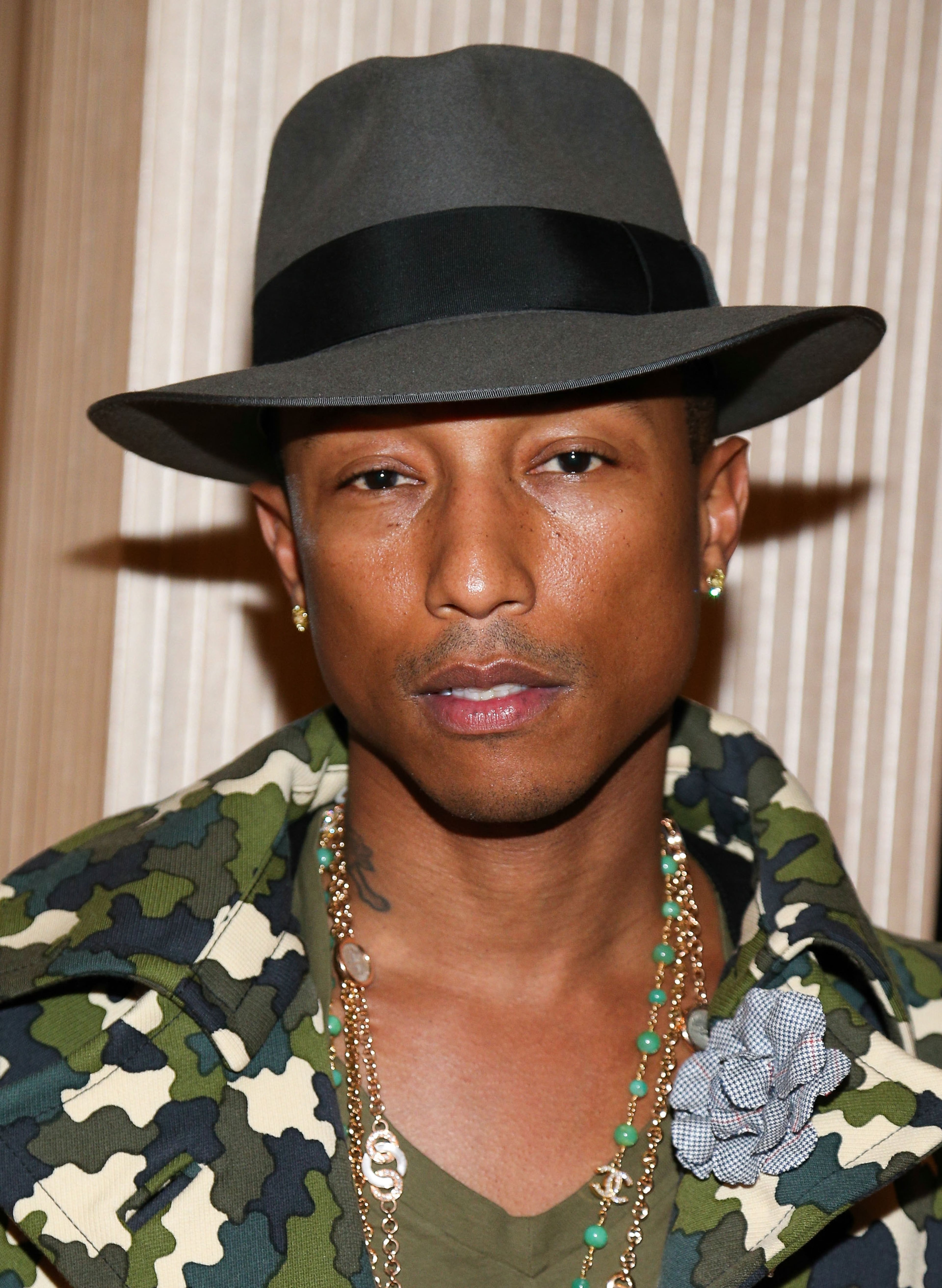 Singer/songwriter Pharrell Williams attends the STARS 2013 Benefit Gala By The Fulfillment Fund at The Beverly Hilton Hotel on October 23, 2013 in Beverly Hills, California. (Photo by Imeh Akpanudosen/Getty Images)