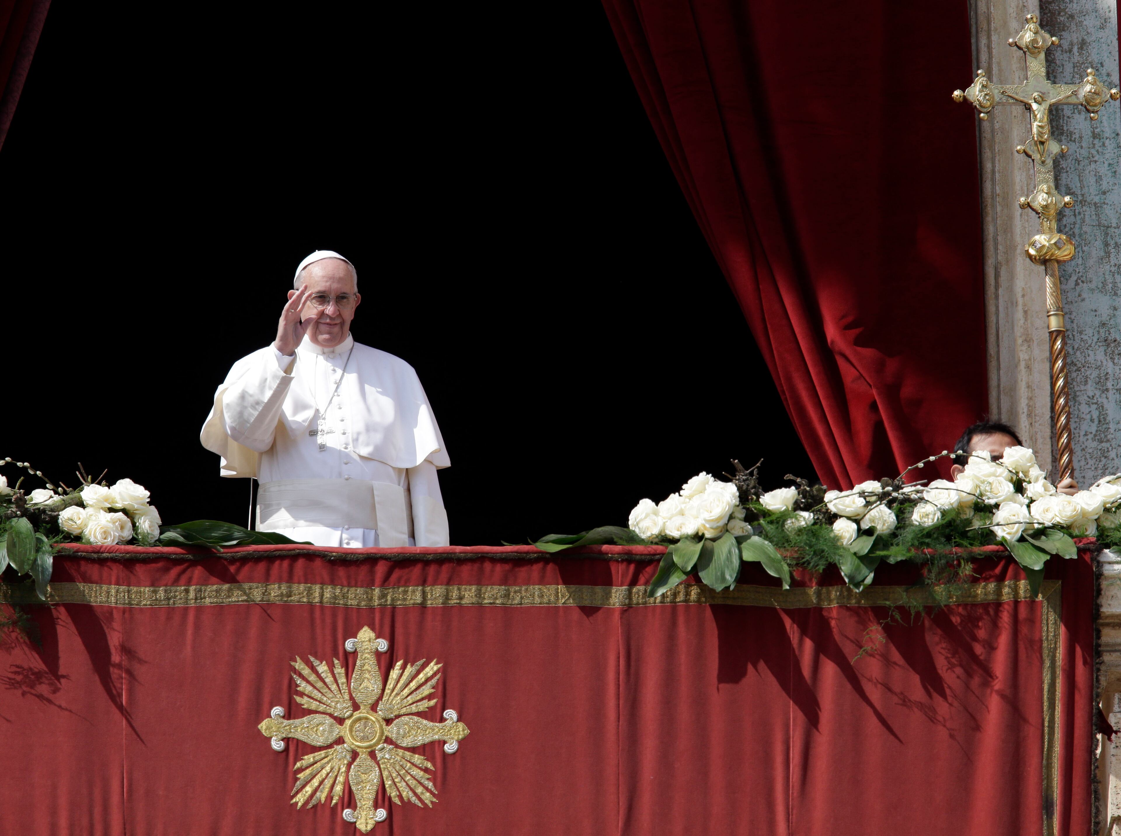 Pope Francis delivers the Urbi et Orbi (to the city and to the world) message at end of the Easter Mass, in St. Peter's Square, at the Vatican, on March 27, 2016.